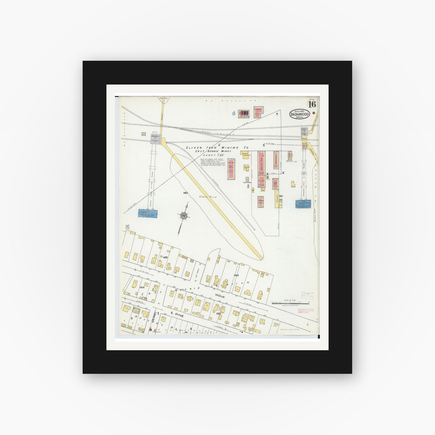 Old map wall art mockup — black gallery frame with white mat — Sanborn Fire Insurance Map from Ironwood, Gogebic County, Michigan (1921), Sheet #0016