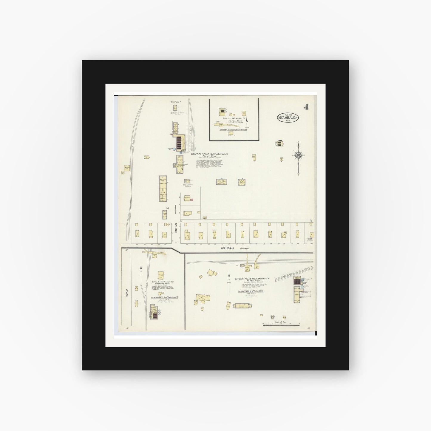 Old map wall art mockup — black gallery frame with white mat — Sanborn Fire Insurance Map from Stambaugh, Iron County, Michigan (1913), Sheet #0004