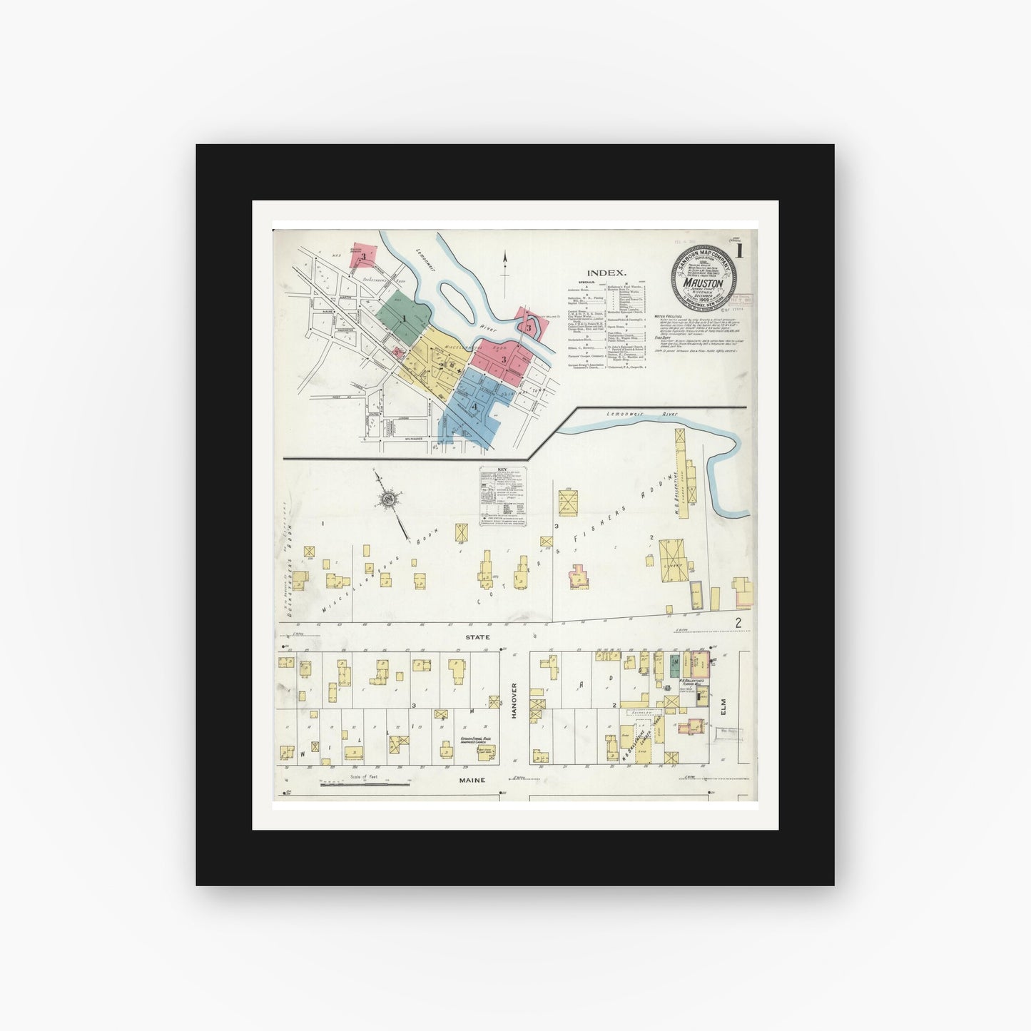 Old map wall art mockup — black gallery frame with white mat — Sanborn Fire Insurance Map from Mauston, Juneau County, Wisconsin (1909), Sheet #0001