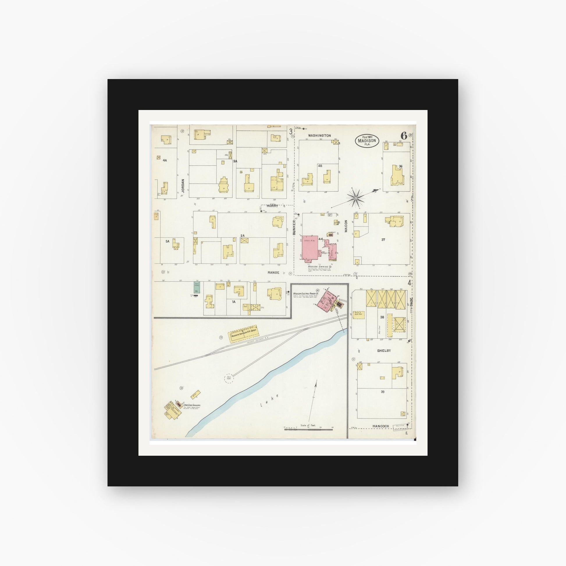 Old map wall art mockup — black gallery frame with white mat — Sanborn Fire Insurance Map from Madison, Madison County, Florida (1903), Sheet #0006