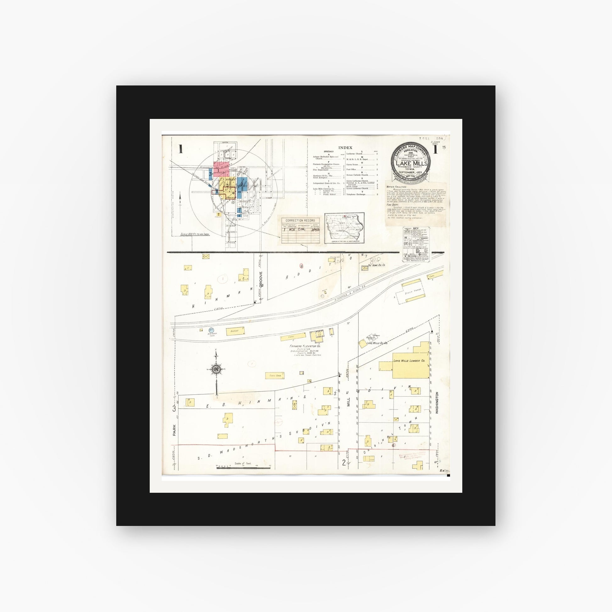 Old map wall art mockup — black gallery frame with white mat — Sanborn Fire Insurance Map from Lake Mills, Winnebago County, Iowa (1935), Sheet #0001