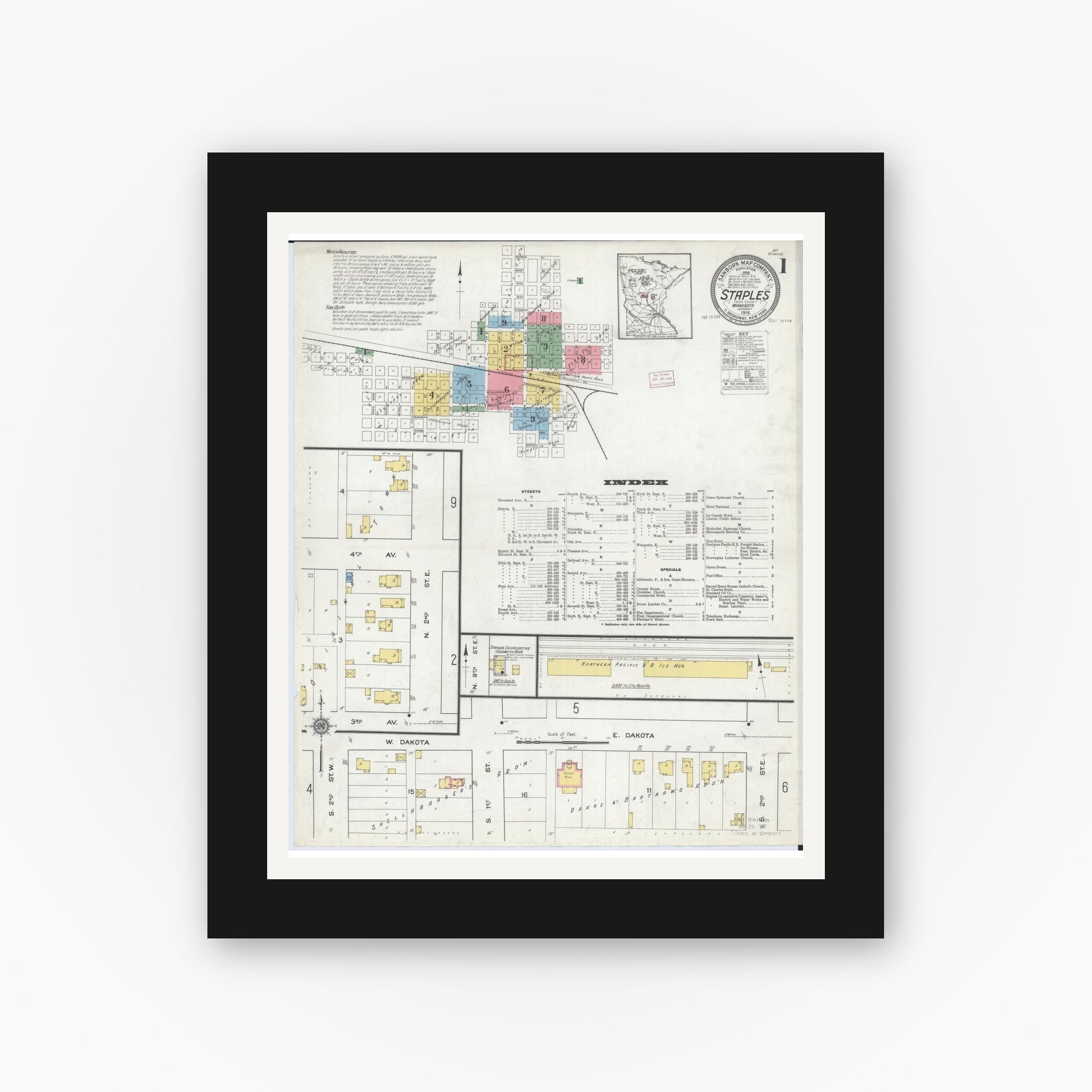 Old map wall art mockup — black gallery frame with white mat — Sanborn Fire Insurance Map from Staples, Todd County, Minnesota (1916) - Complete Map Set