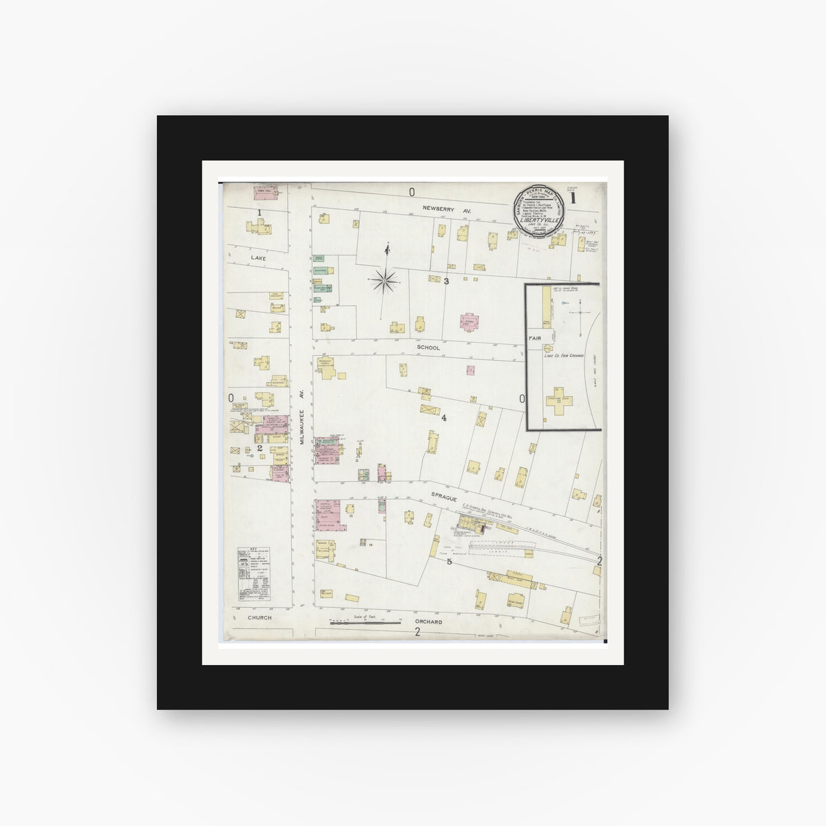 Old map wall art mockup — black gallery frame with white mat — Sanborn Fire Insurance Map from Libertyville, Lake County, Illinois (1897), Sheet #0001