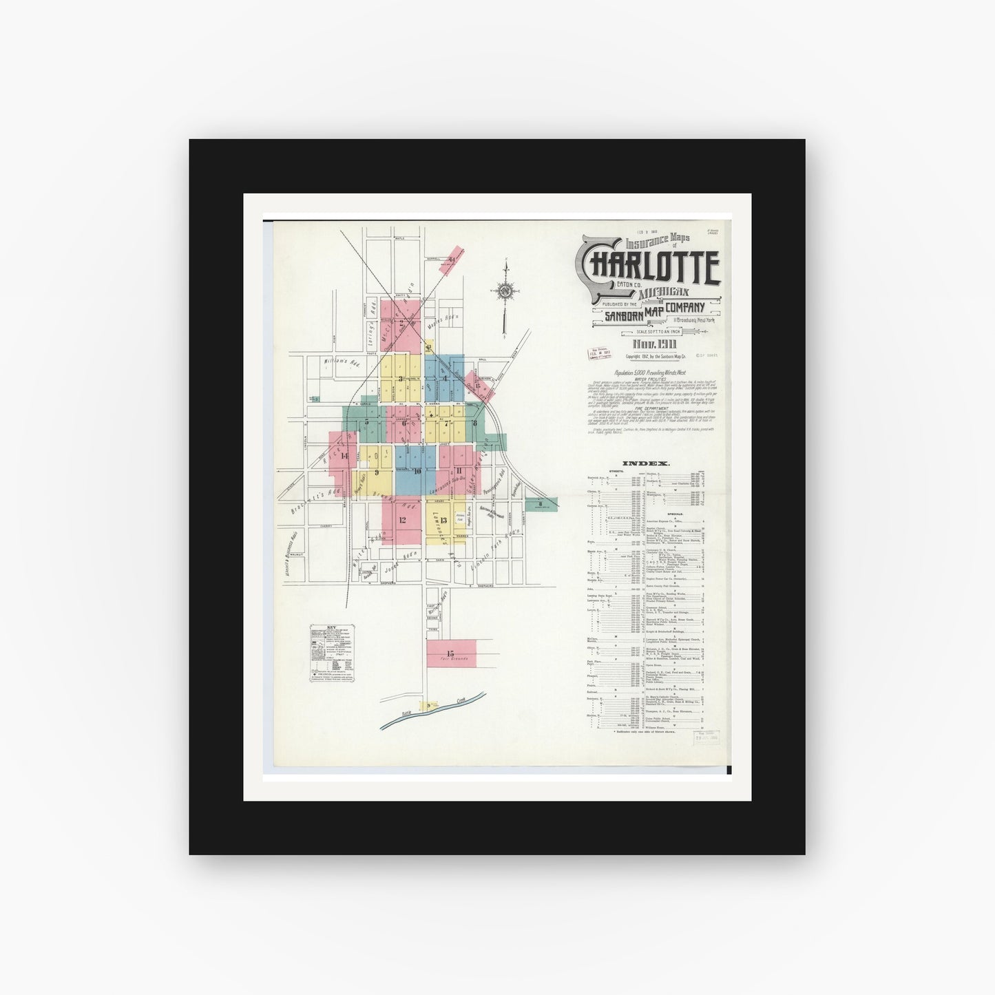 Old map wall art mockup — black gallery frame with white mat — Sanborn Fire Insurance Map from Charlotte, Eaton County, Michigan (1911) - Complete Map Set