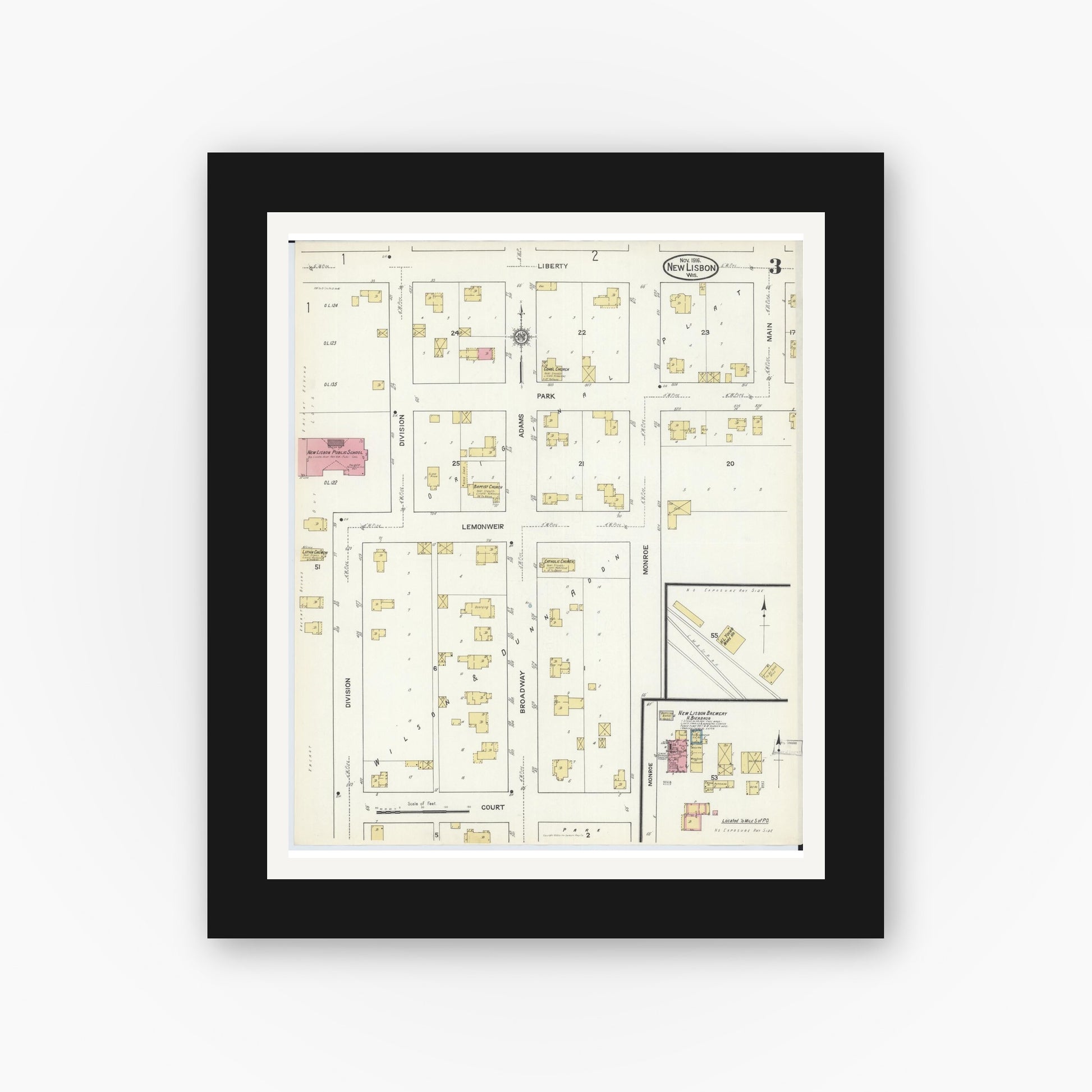 Old map wall art mockup — black gallery frame with white mat — Sanborn Fire Insurance Map from New Lisbon, Juneau County, Wisconsin (1916), Sheet #0003