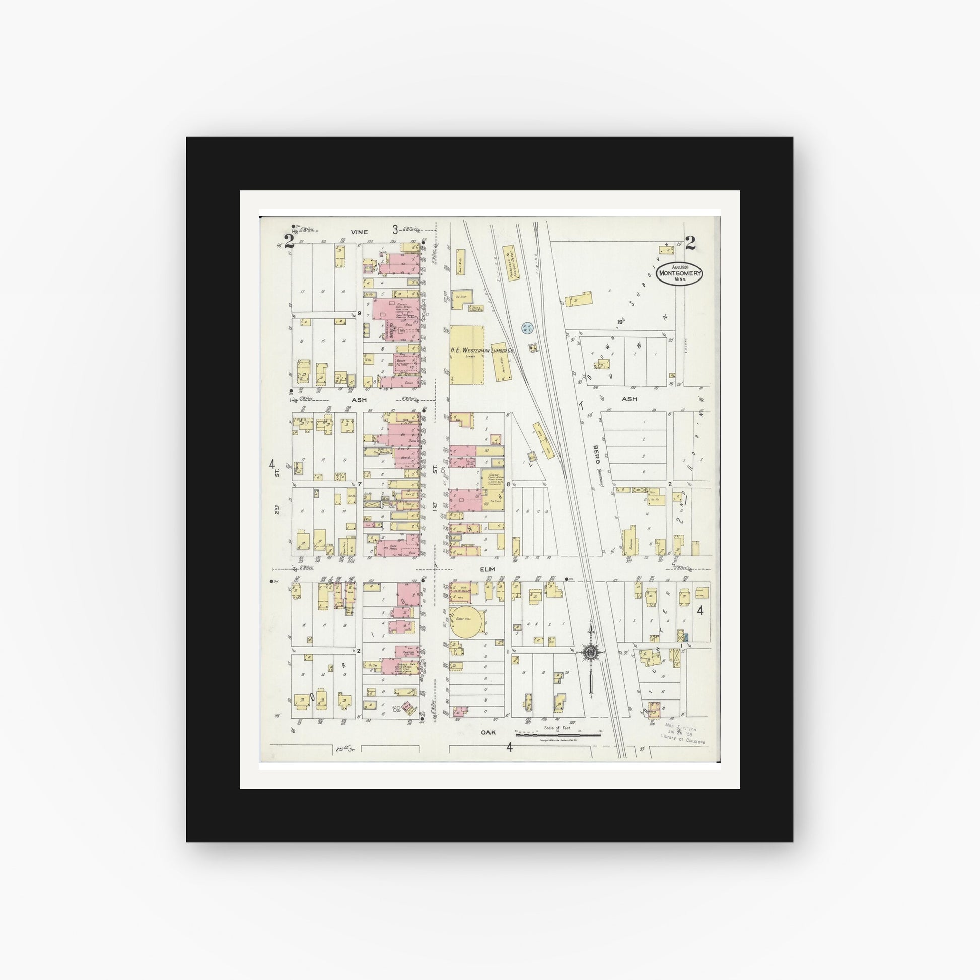 Old map wall art mockup — black gallery frame with white mat — Sanborn Fire Insurance Map from Montgomery, Le Sueur County, Minnesota (1924), Sheet #0002