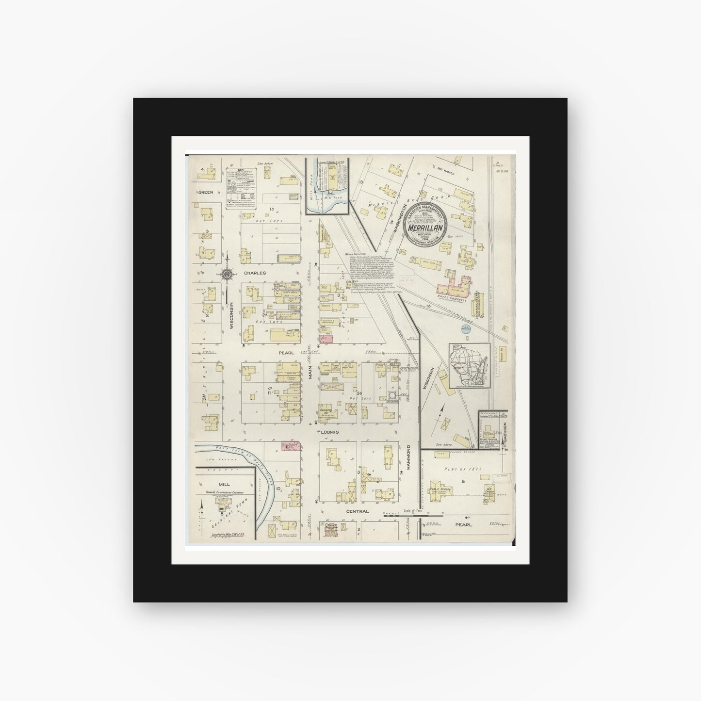 Old map wall art mockup — black gallery frame with white mat — Sanborn Fire Insurance Map from Merrillan, Jackson County, Wisconsin (1914), Sheet #0001