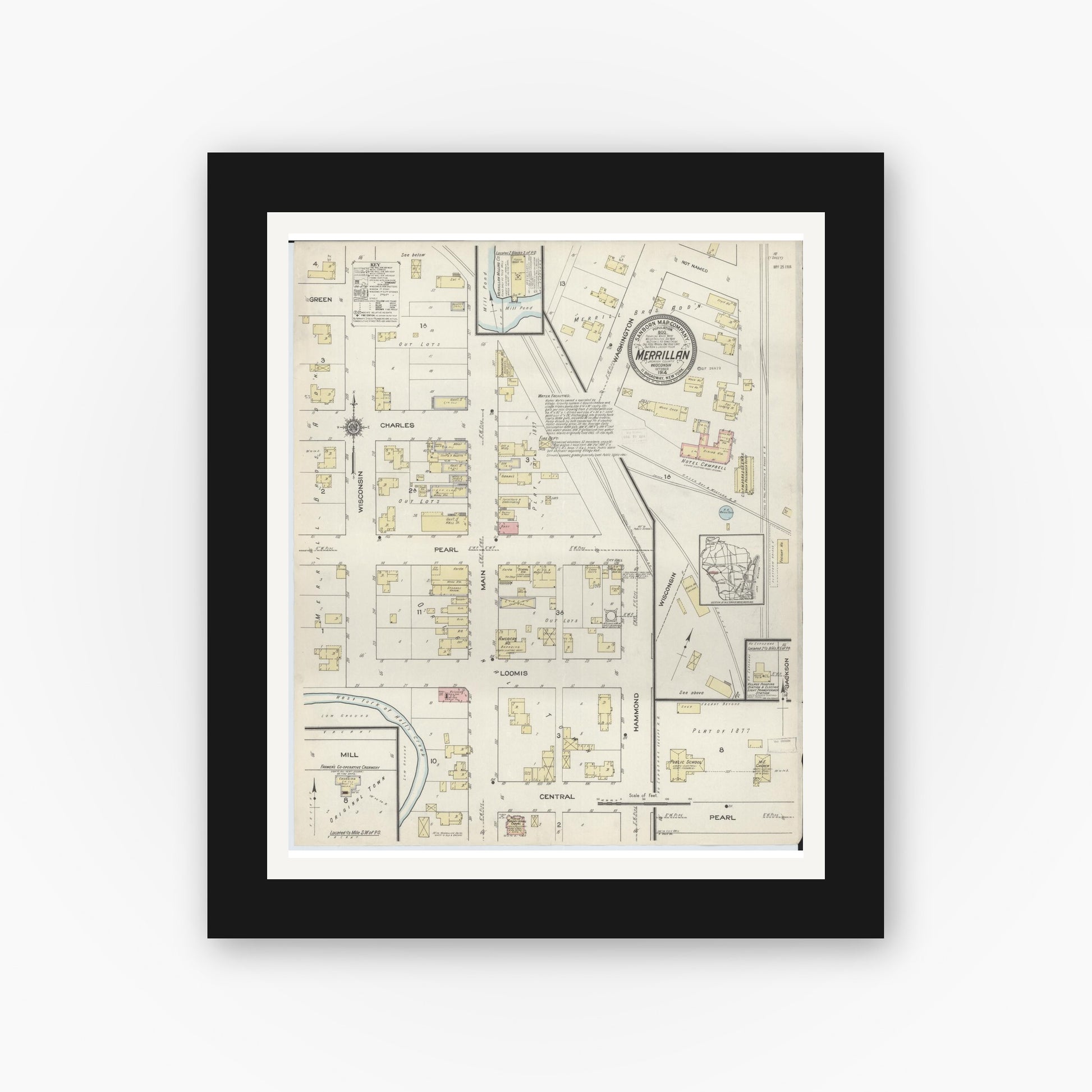 Old map wall art mockup — black gallery frame with white mat — Sanborn Fire Insurance Map from Merrillan, Jackson County, Wisconsin (1914), Sheet #0001