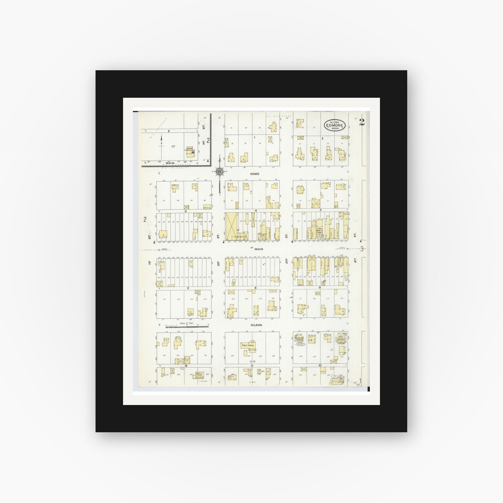 Old map wall art mockup — black gallery frame with white mat — Sanborn Fire Insurance Map from Edmore, Montcalm County, Michigan (1910), Sheet #0002