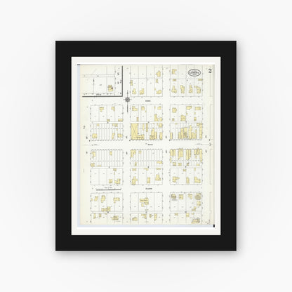 Old map wall art mockup — black gallery frame with white mat — Sanborn Fire Insurance Map from Edmore, Montcalm County, Michigan (1910), Sheet #0002