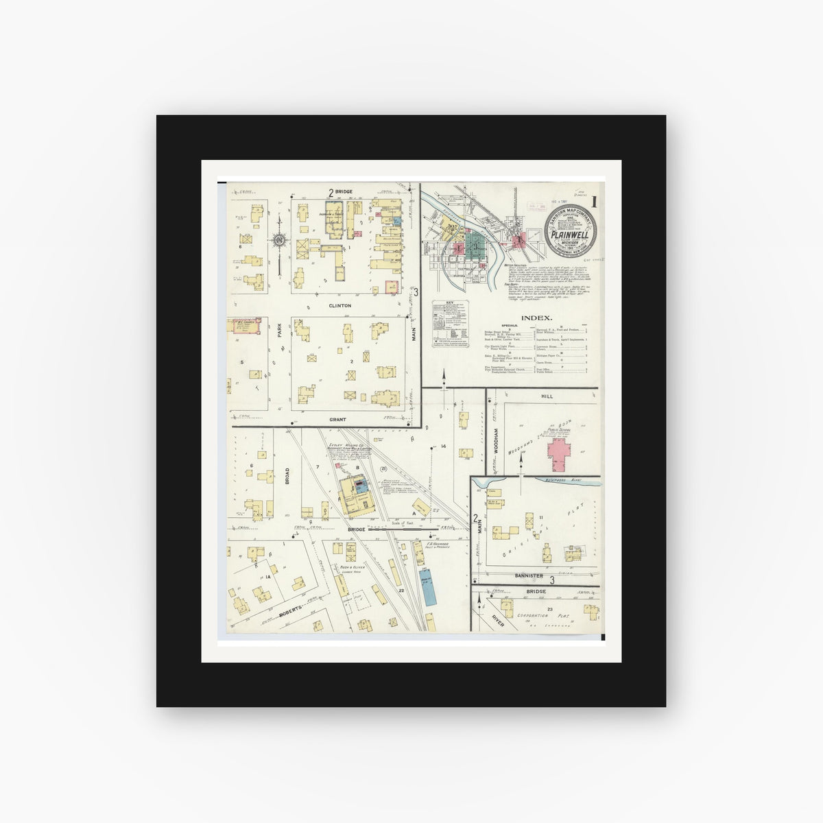 Old map wall art mockup — black gallery frame with white mat — Sanborn Fire Insurance Map from Plainwell, Allegan County, Michigan (1911), Sheet #0001