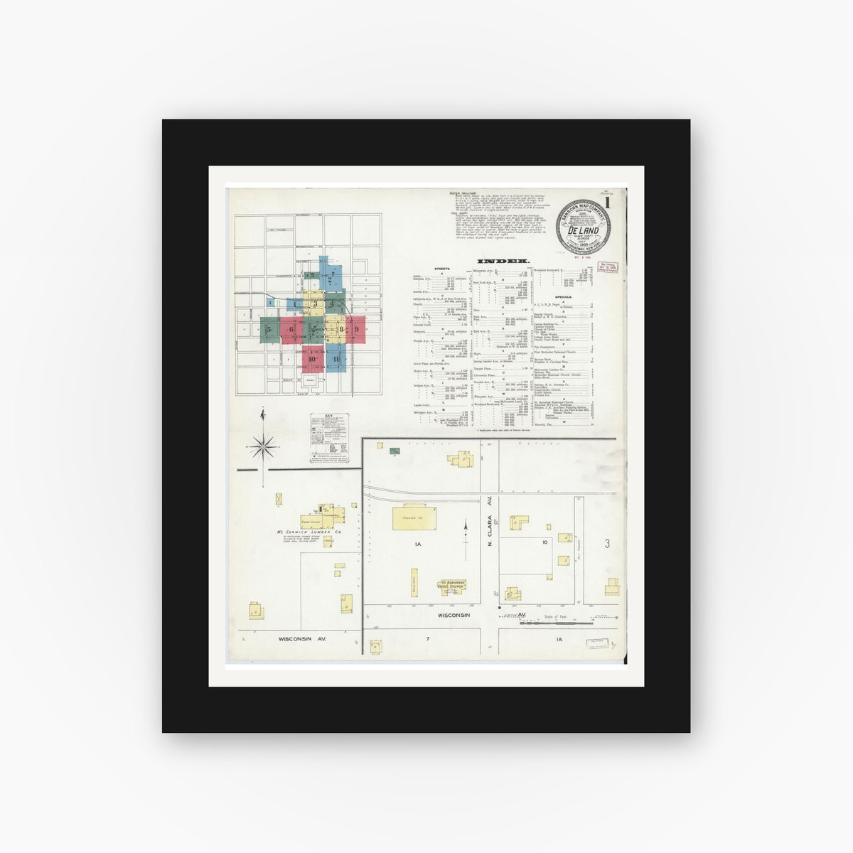 Old map wall art mockup — black gallery frame with white mat — Sanborn Fire Insurance Map from De Land, Volusia County, Florida (1909) - Complete Map Set