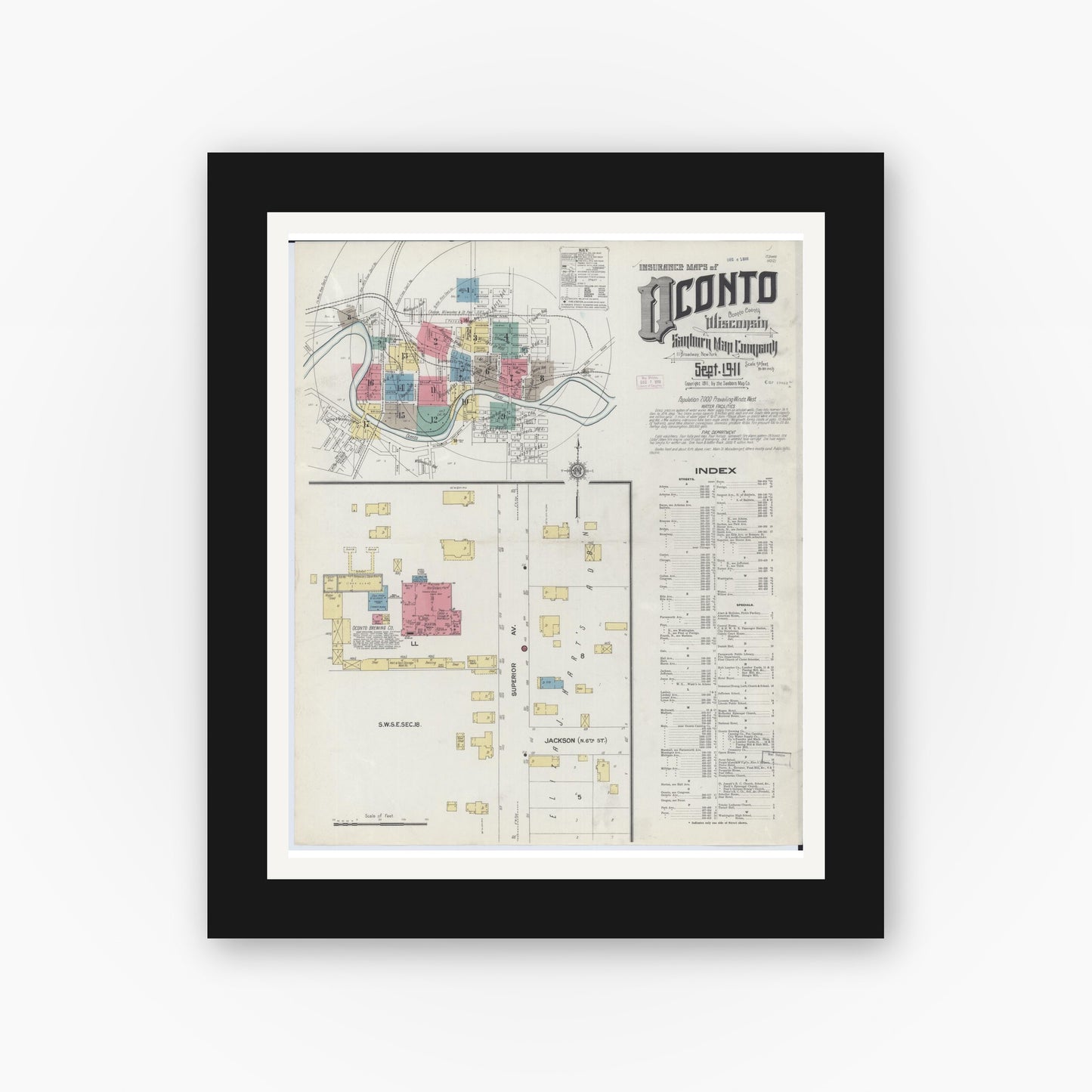 Old map wall art mockup — black gallery frame with white mat — Sanborn Fire Insurance Map from Oconto, Oconto County, Wisconsin (1911), Sheet #0001