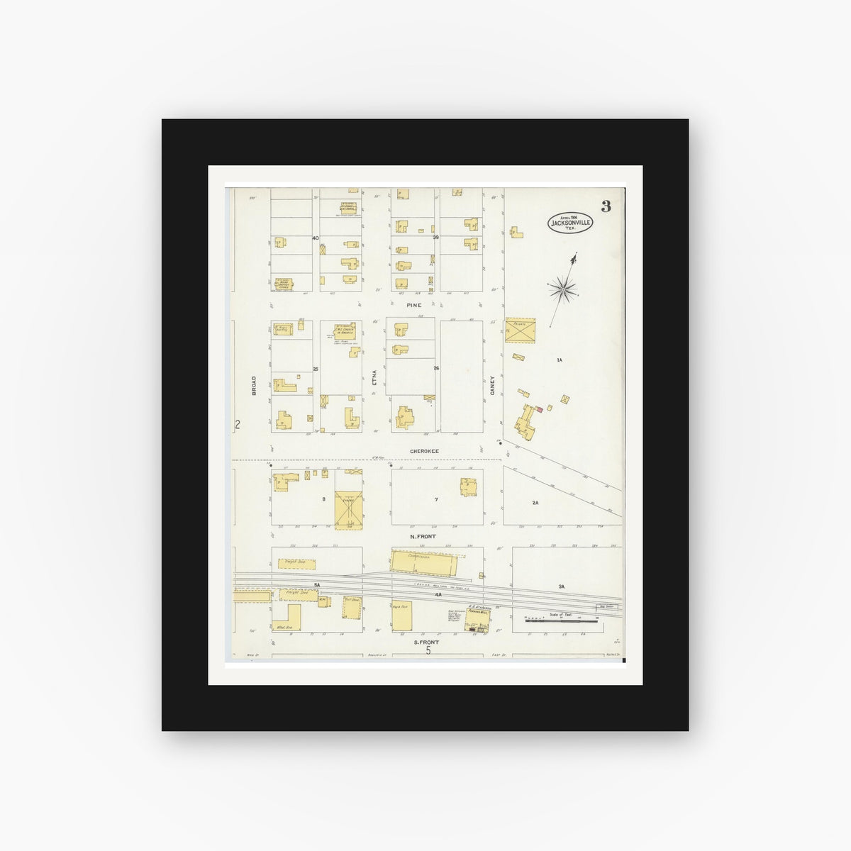 Old map wall art mockup — black gallery frame with white mat — Sanborn Fire Insurance Map from Jacksonville, Cherokee County, Texas (1906), Sheet #0003