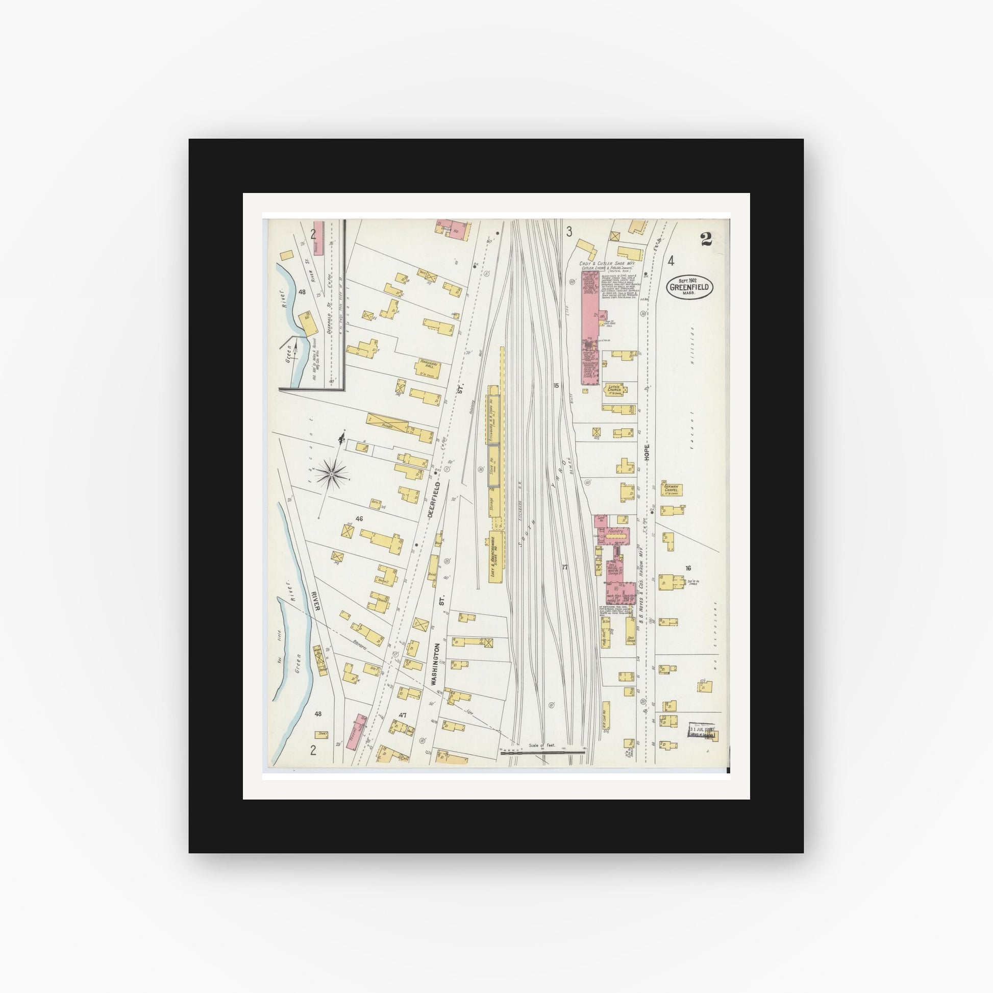 Old map wall art mockup — black gallery frame with white mat — Sanborn Fire Insurance Map from Greenfield, Franklin County, Massachusetts (1902), Sheet #0002