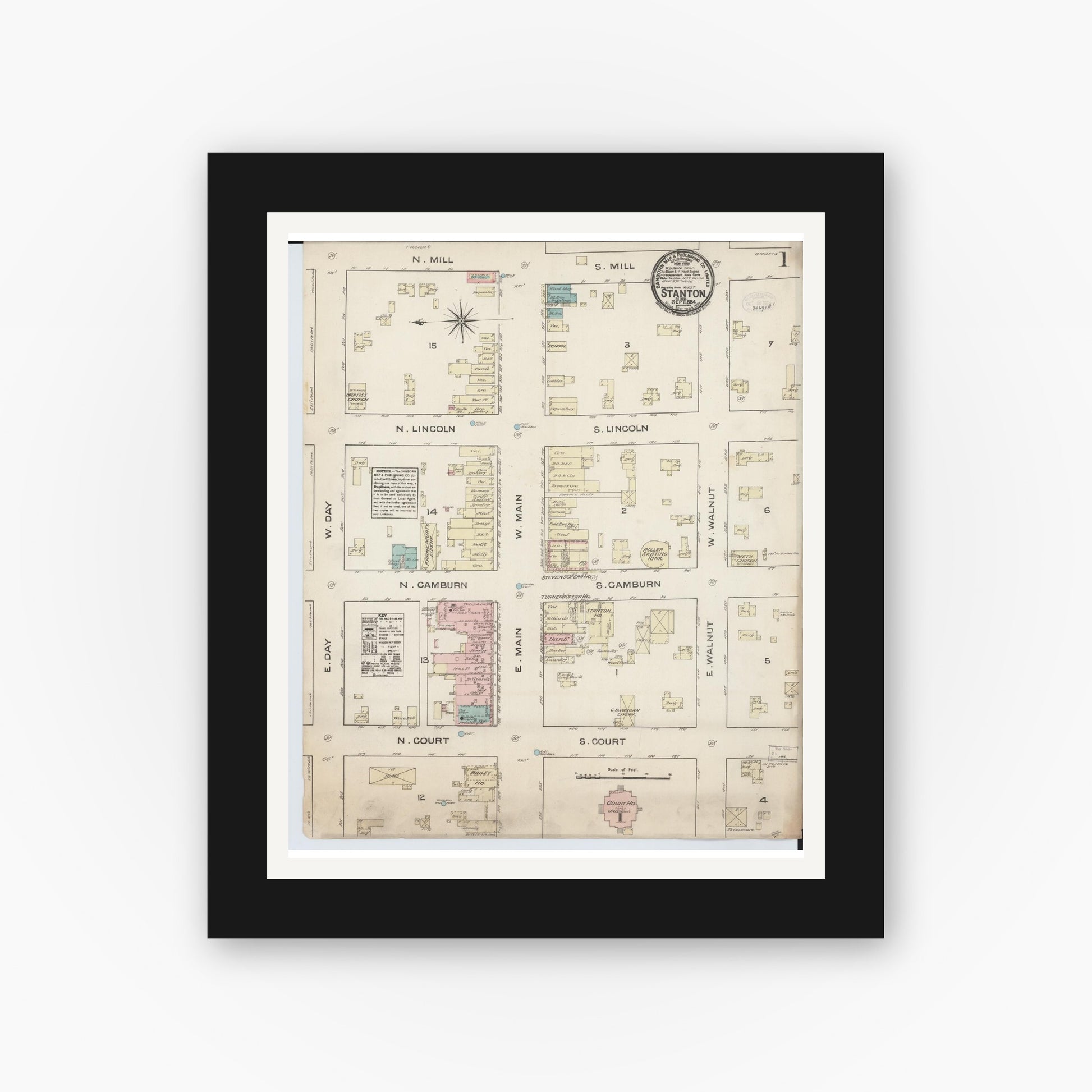 Old map wall art mockup — black gallery frame with white mat — Sanborn Fire Insurance Map from Stanton, Montcalm County, Michigan (1884) - Complete Map Set