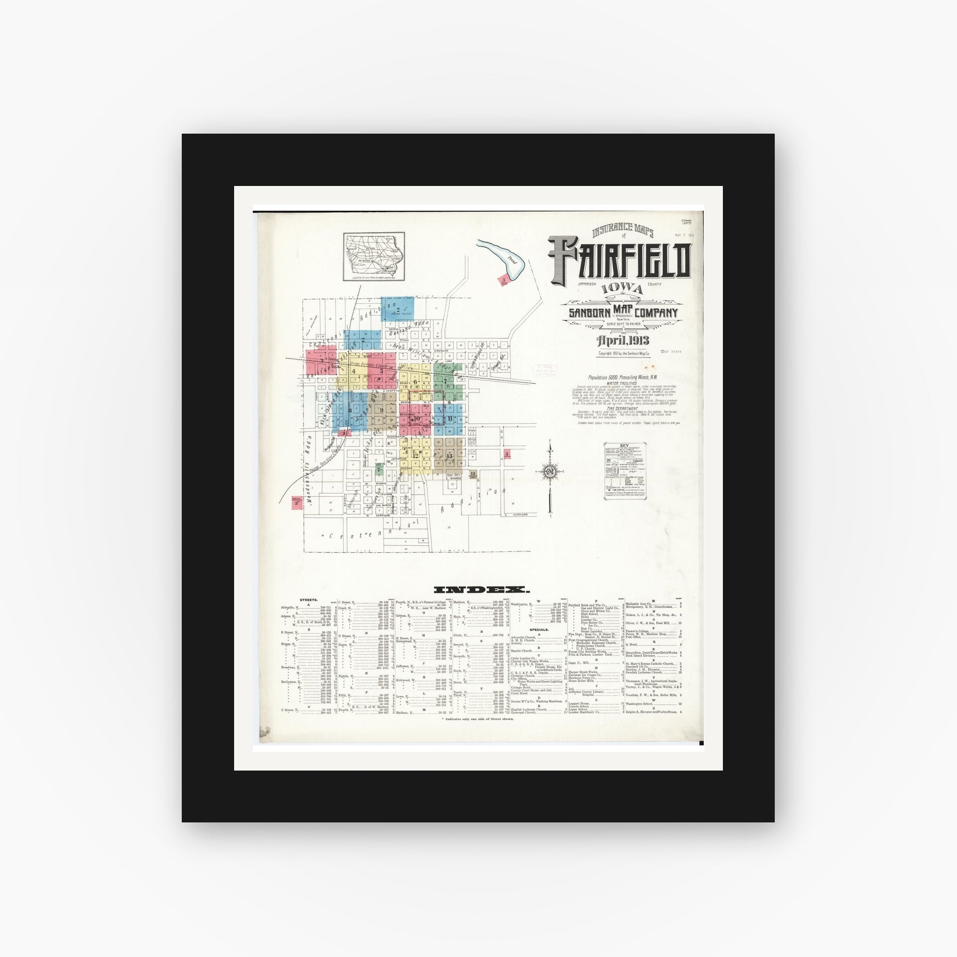 Old map wall art mockup — black gallery frame with white mat — Sanborn Fire Insurance Map from Fairfield, Jefferson County, Iowa (1913) â€” Complete Set