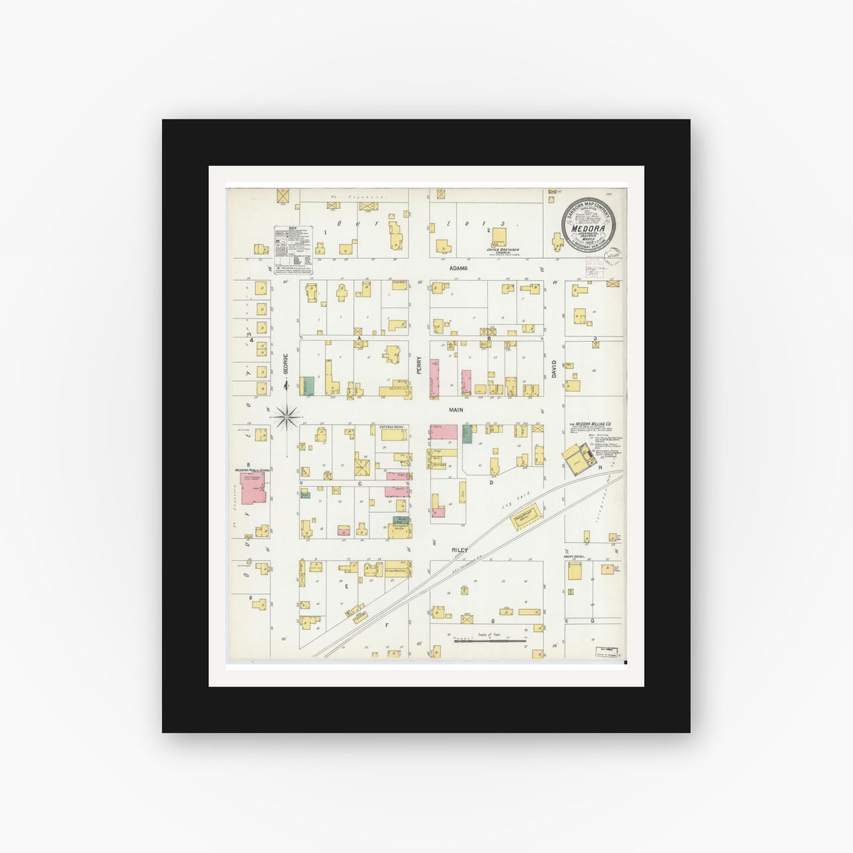 Old map wall art mockup — black gallery frame with white mat — Sanborn Fire Insurance Map from Medora, Jackson County, Indiana (1902), Sheet #0001