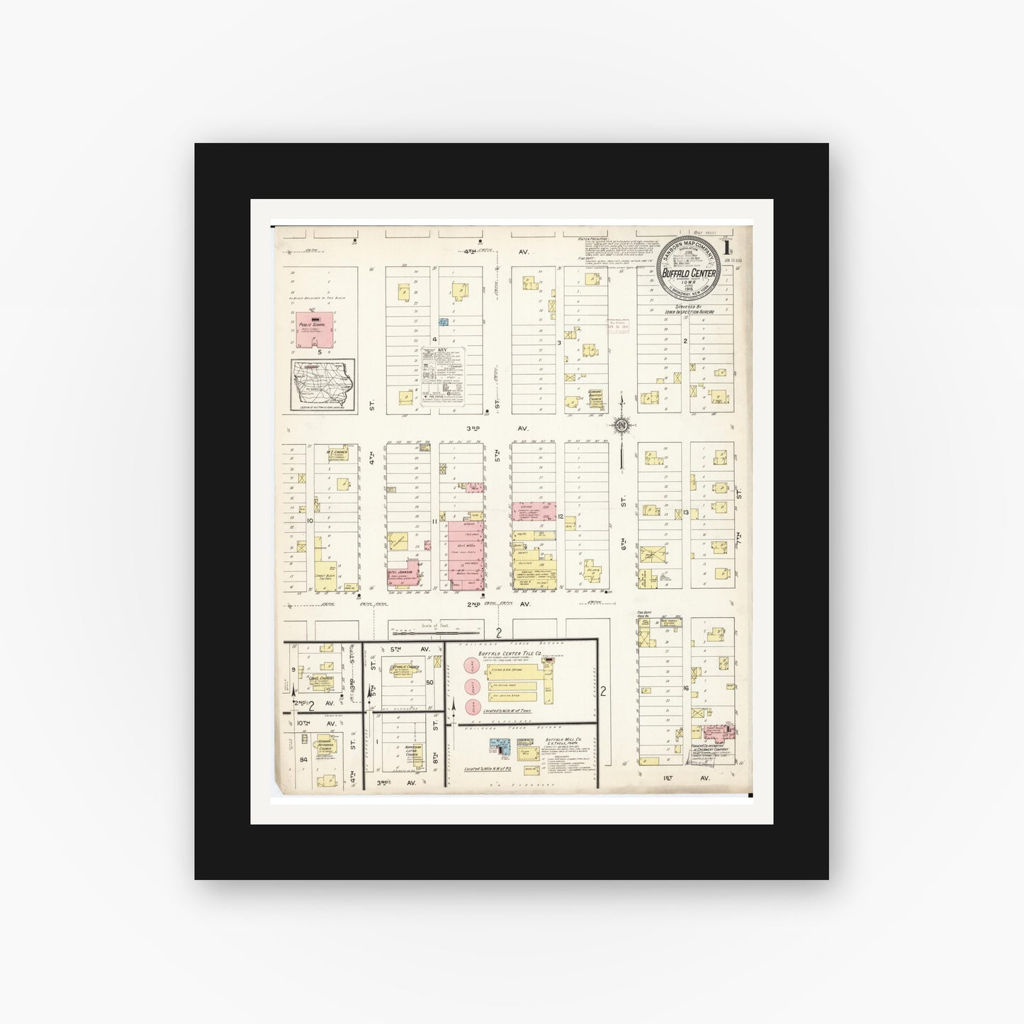 Old map wall art mockup — black gallery frame with white mat — Sanborn Fire Insurance Map from Buffalo Center, Winnebago County, Iowa (1915) â€” Complete Set