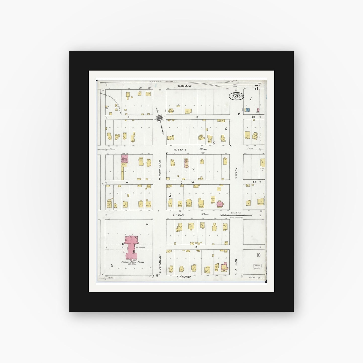 Old map wall art mockup — black gallery frame with white mat — Sanborn Fire Insurance Map from Paxton, Ford County, Illinois (1921), Sheet #0005