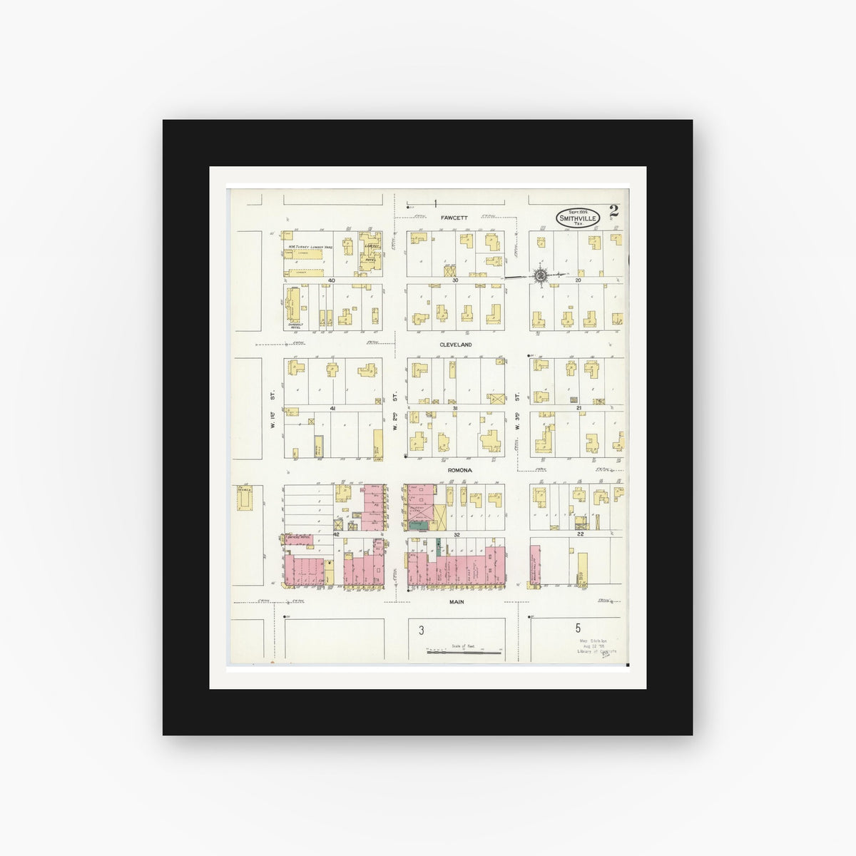 Old map wall art mockup — black gallery frame with white mat — Sanborn Fire Insurance Map from Smithville, Bastrop County, Texas (1909), Sheet #0002