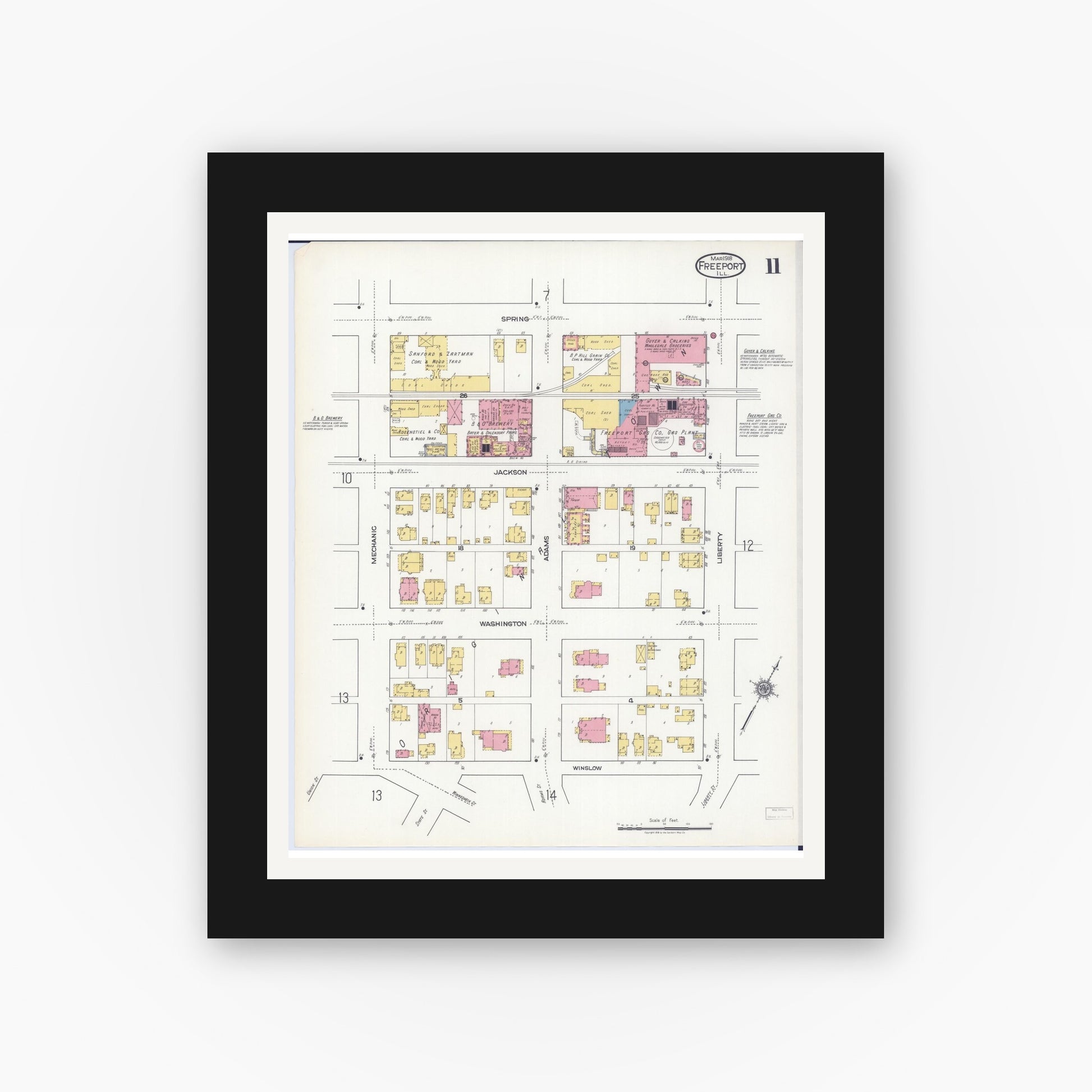 Old map wall art mockup — black gallery frame with white mat — Sanborn Fire Insurance Map from Freeport, Stephenson County, Illinois (1918), Sheet #0011