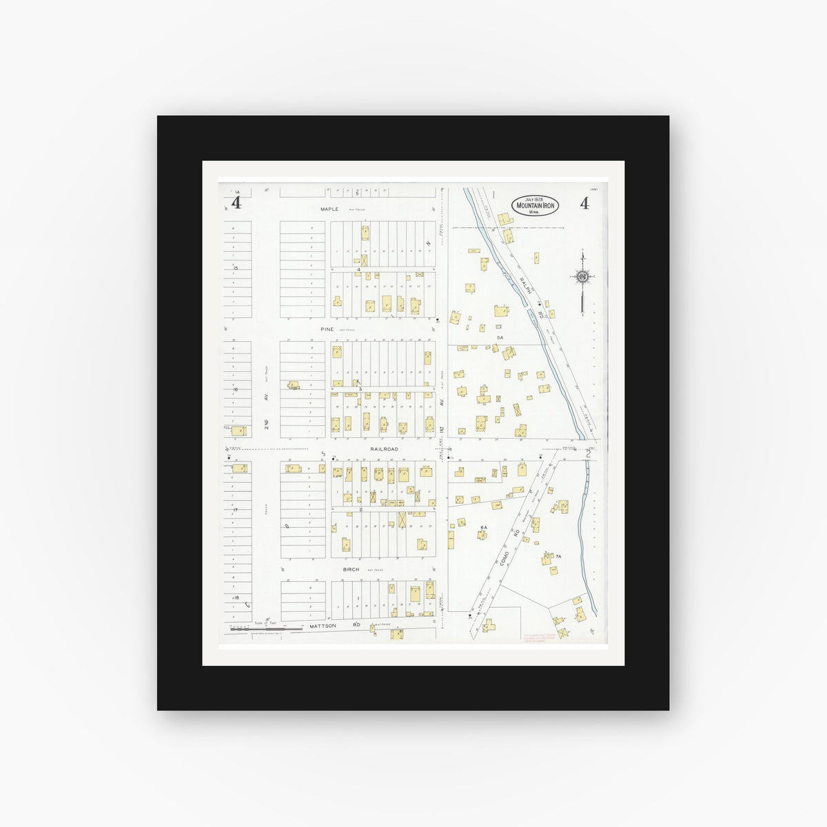 Old map wall art mockup — black gallery frame with white mat — Sanborn Fire Insurance Map from Mountain Iron, Saint Louis County, Minnesota (1928), Sheet #0004