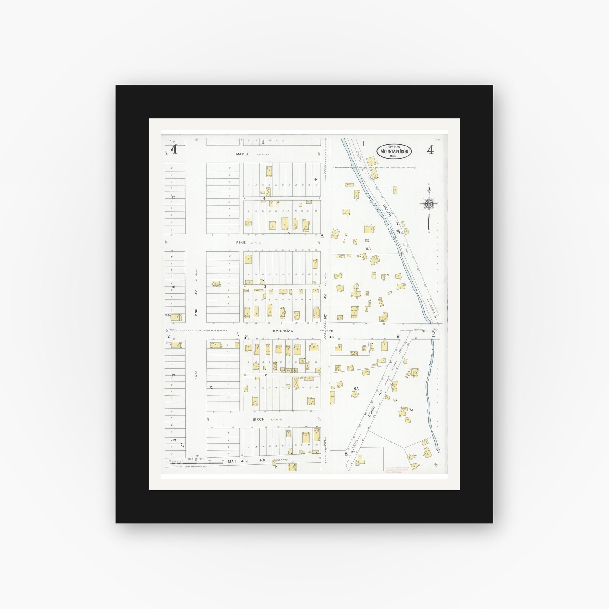Old map wall art mockup — black gallery frame with white mat — Sanborn Fire Insurance Map from Mountain Iron, Saint Louis County, Minnesota (1928), Sheet #0004