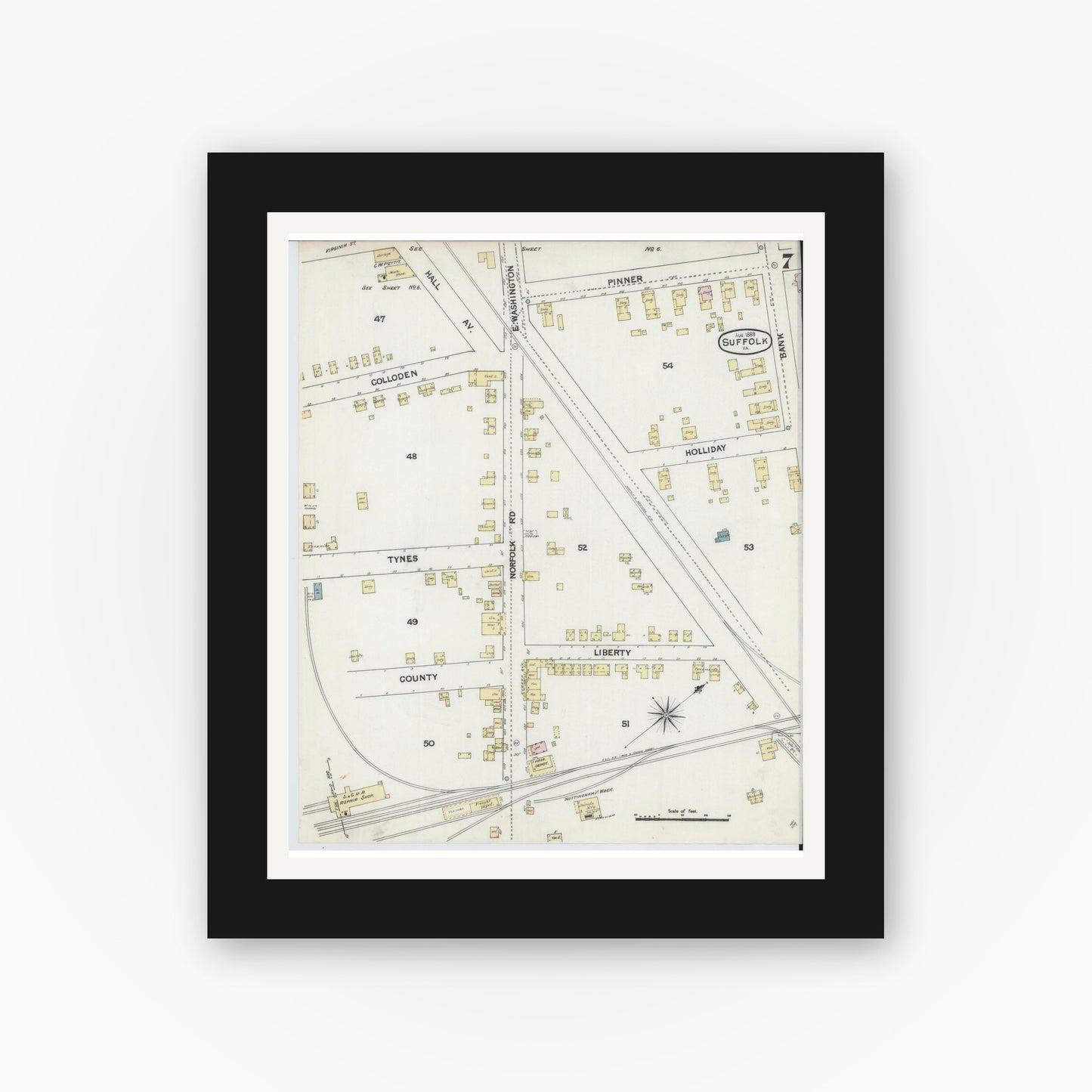 Old map wall art mockup — black gallery frame with white mat — Sanborn Fire Insurance Map from Suffolk, Independent Cities, Virginia (1889), Sheet #0007