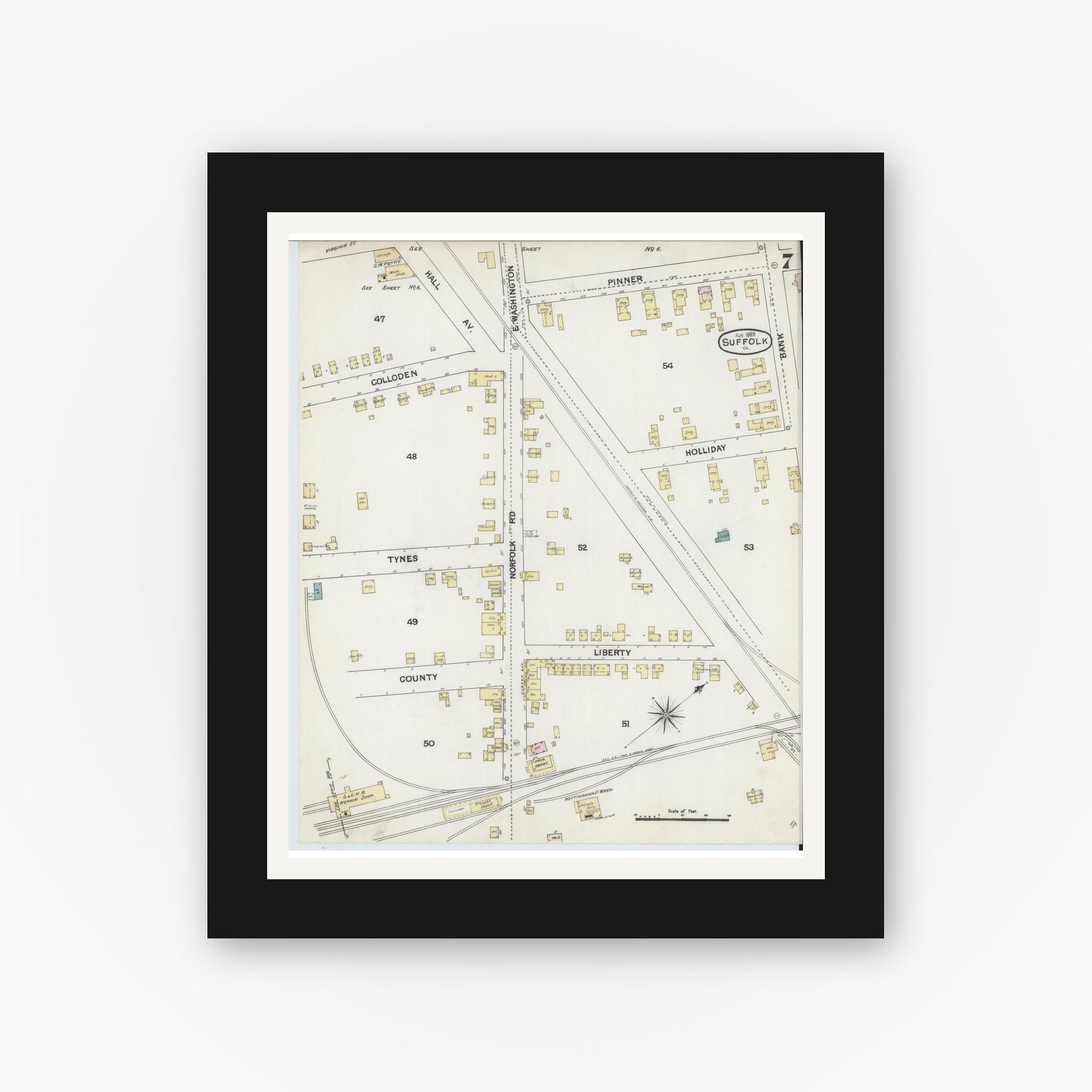 Old map wall art mockup — black gallery frame with white mat — Sanborn Fire Insurance Map from Suffolk, Independent Cities, Virginia (1889), Sheet #0007