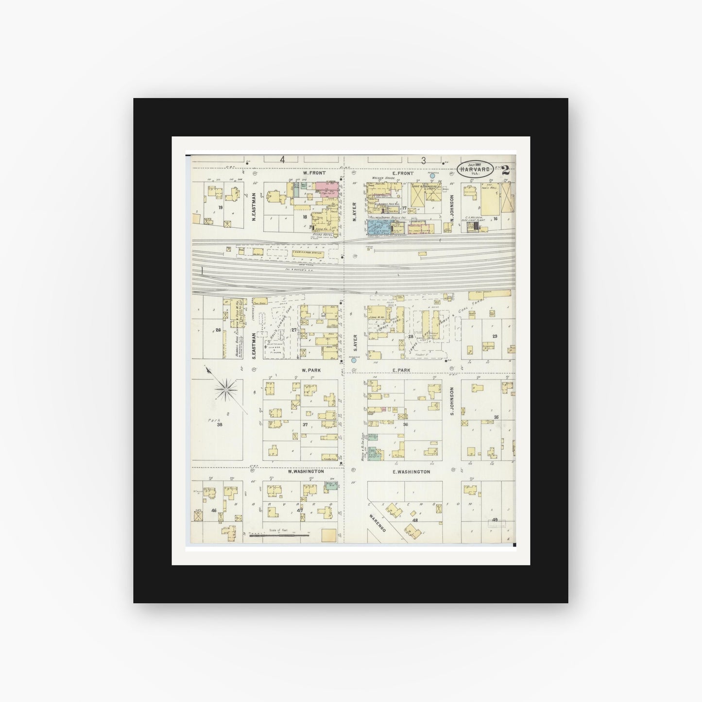 Old map wall art mockup — black gallery frame with white mat — Sanborn Fire Insurance Map from Harvard, McHenry County, Illinois (1897), Sheet #0002