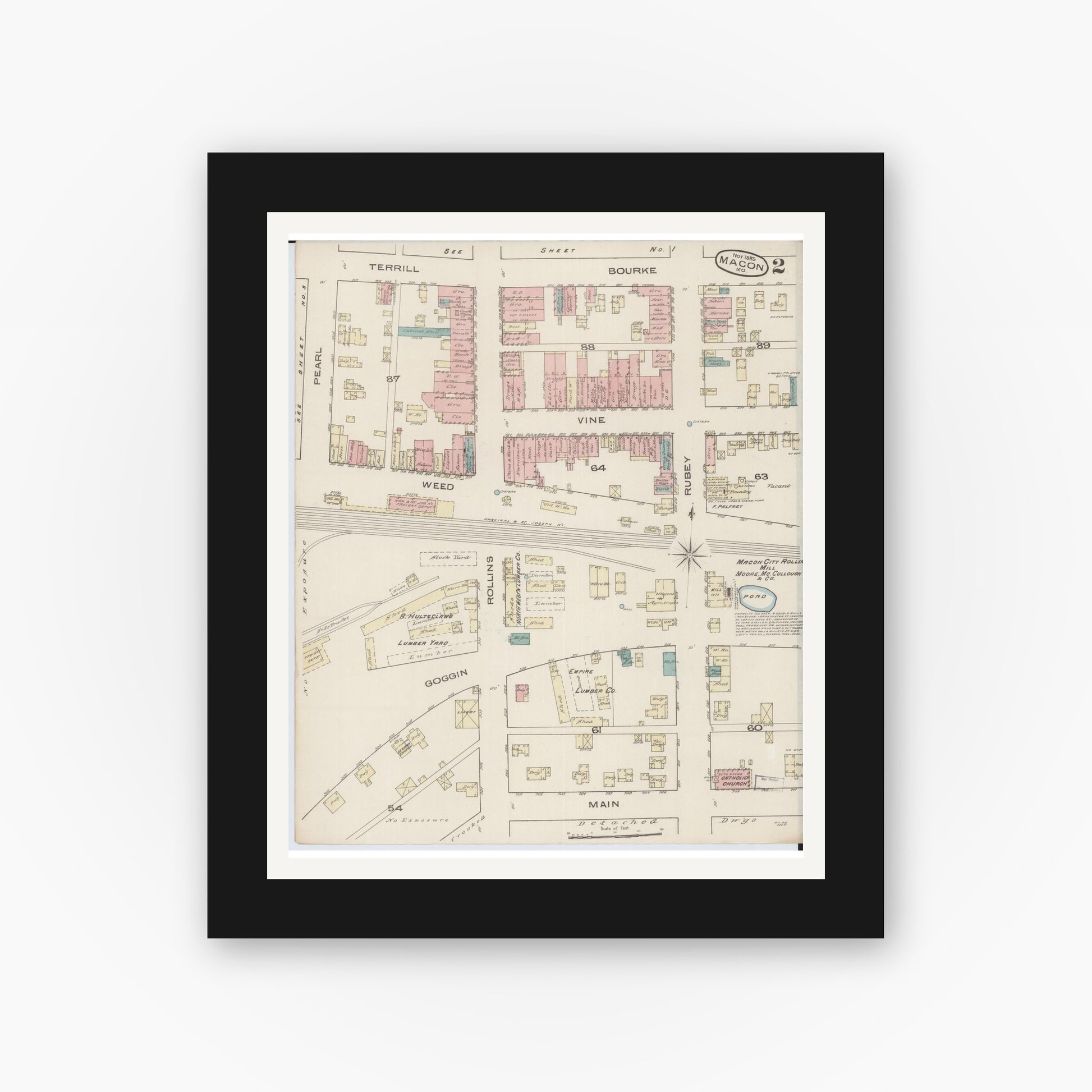 Old map wall art mockup — black gallery frame with white mat — Sanborn Fire Insurance Map from Macon, Macon County, Missouri (1885), Sheet #0002