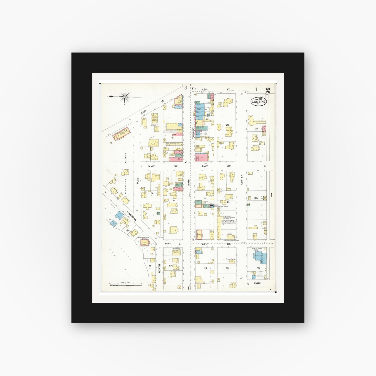 Old map wall art mockup — black gallery frame with white mat — Sanborn Fire Insurance Map from Lansing, Allamakee County, Iowa (1902), Sheet #0002