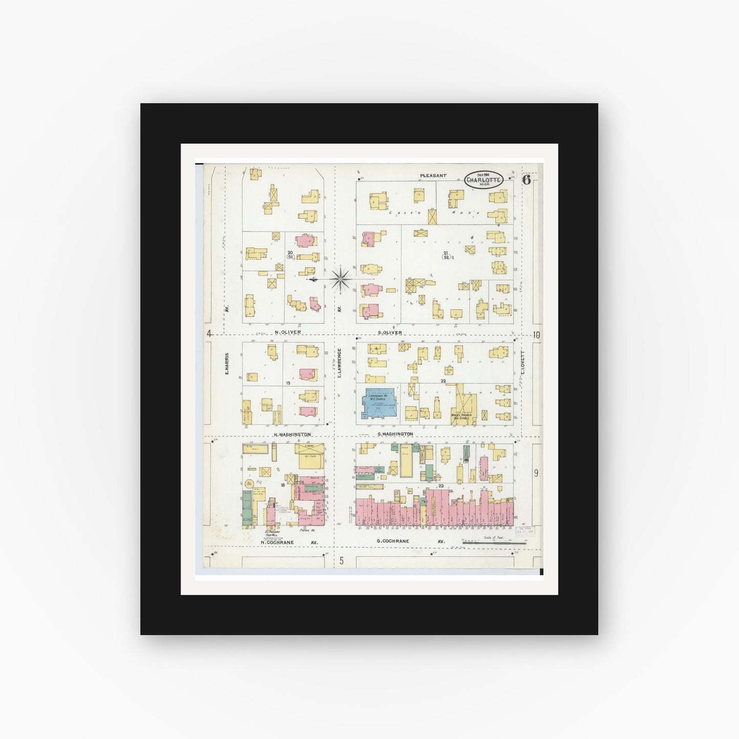Old map wall art mockup — black gallery frame with white mat — Sanborn Fire Insurance Map from Charlotte, Eaton County, Michigan (1904), Sheet #0006