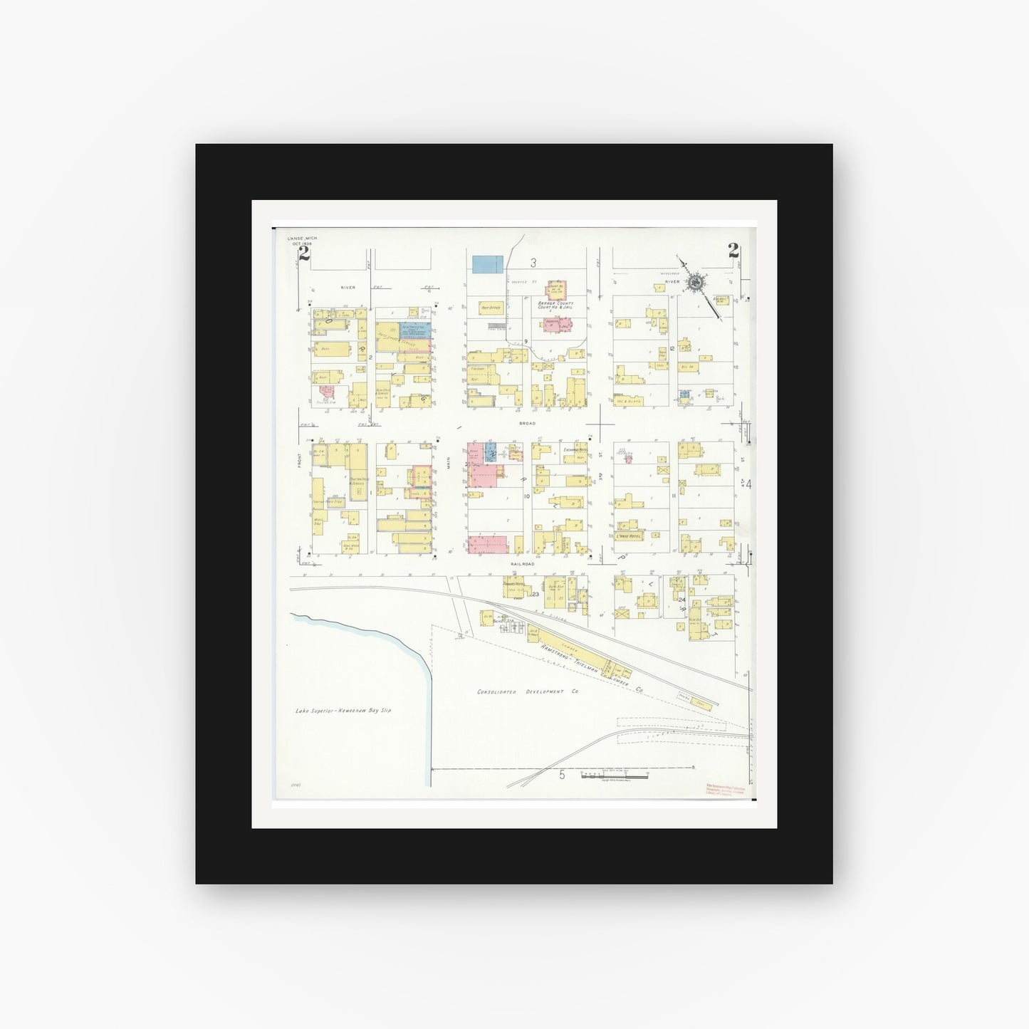 Old map wall art mockup — black gallery frame with white mat — Sanborn Fire Insurance Map from L'Anse, Baraga County, Michigan (1938), Sheet #0002