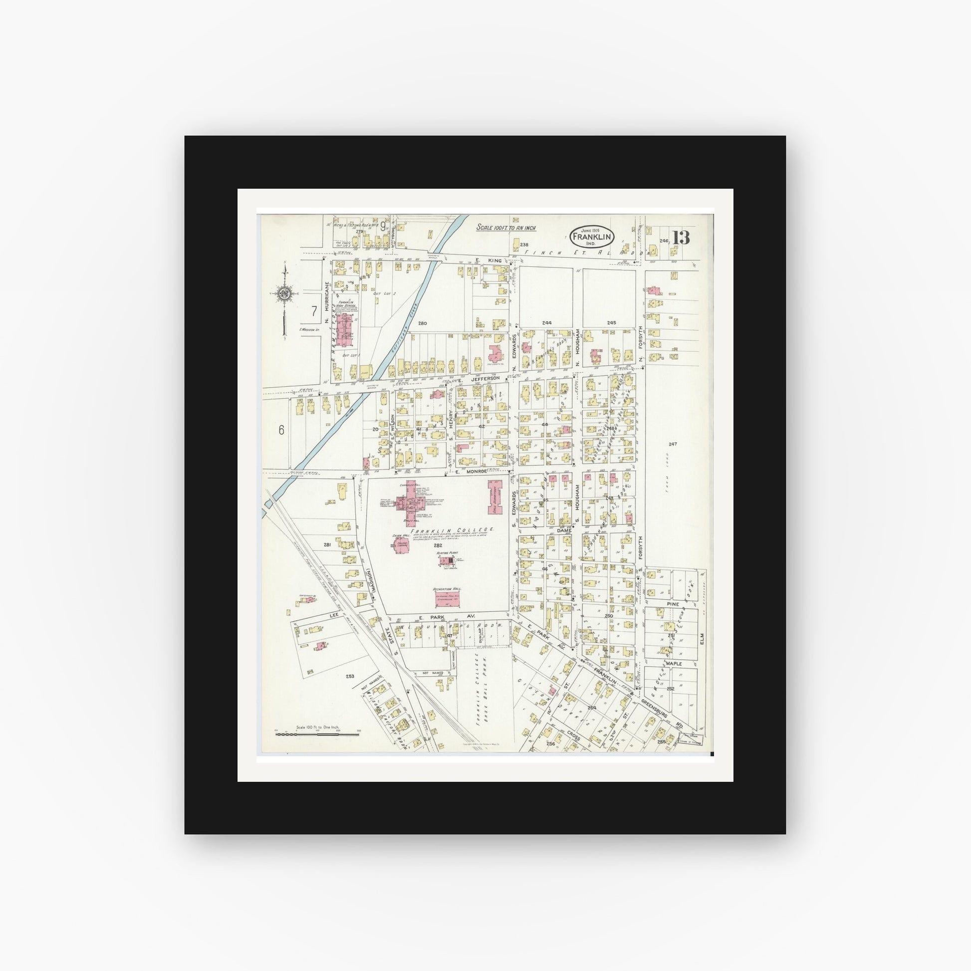 Old map wall art mockup — black gallery frame with white mat — Sanborn Fire Insurance Map from Franklin, Johnson County, Indiana (1916), Sheet #0013