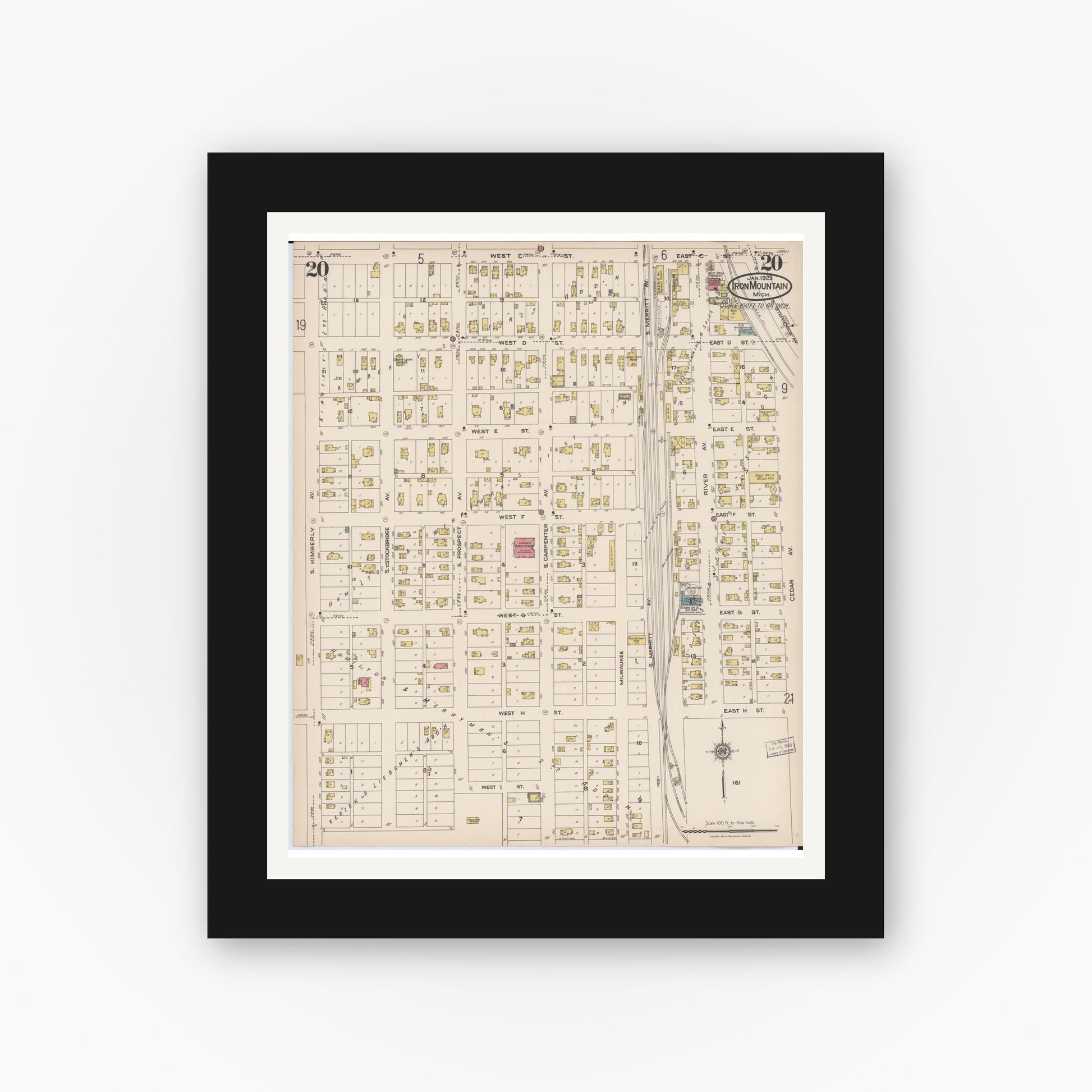 Old map wall art mockup — black gallery frame with white mat — Sanborn Fire Insurance Map from Iron Mountain, Dickinson County, Michigan (1923), Sheet #0020