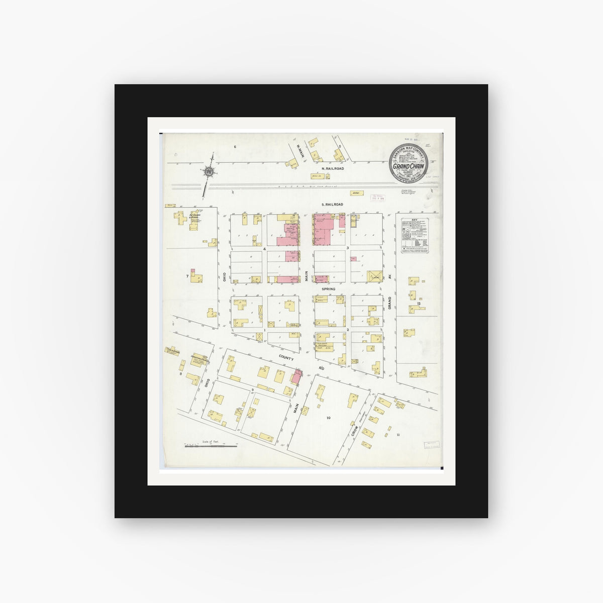 Old map wall art mockup — black gallery frame with white mat — Sanborn Fire Insurance Map from Grand Chain, Pulaski County, Illinois (1911), Sheet #0001