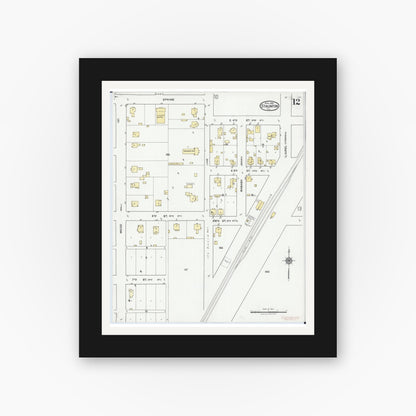 Old map wall art mockup — black gallery frame with white mat — Sanborn Fire Insurance Map from Staunton, Macoupin County, Illinois (1921), Sheet #0012