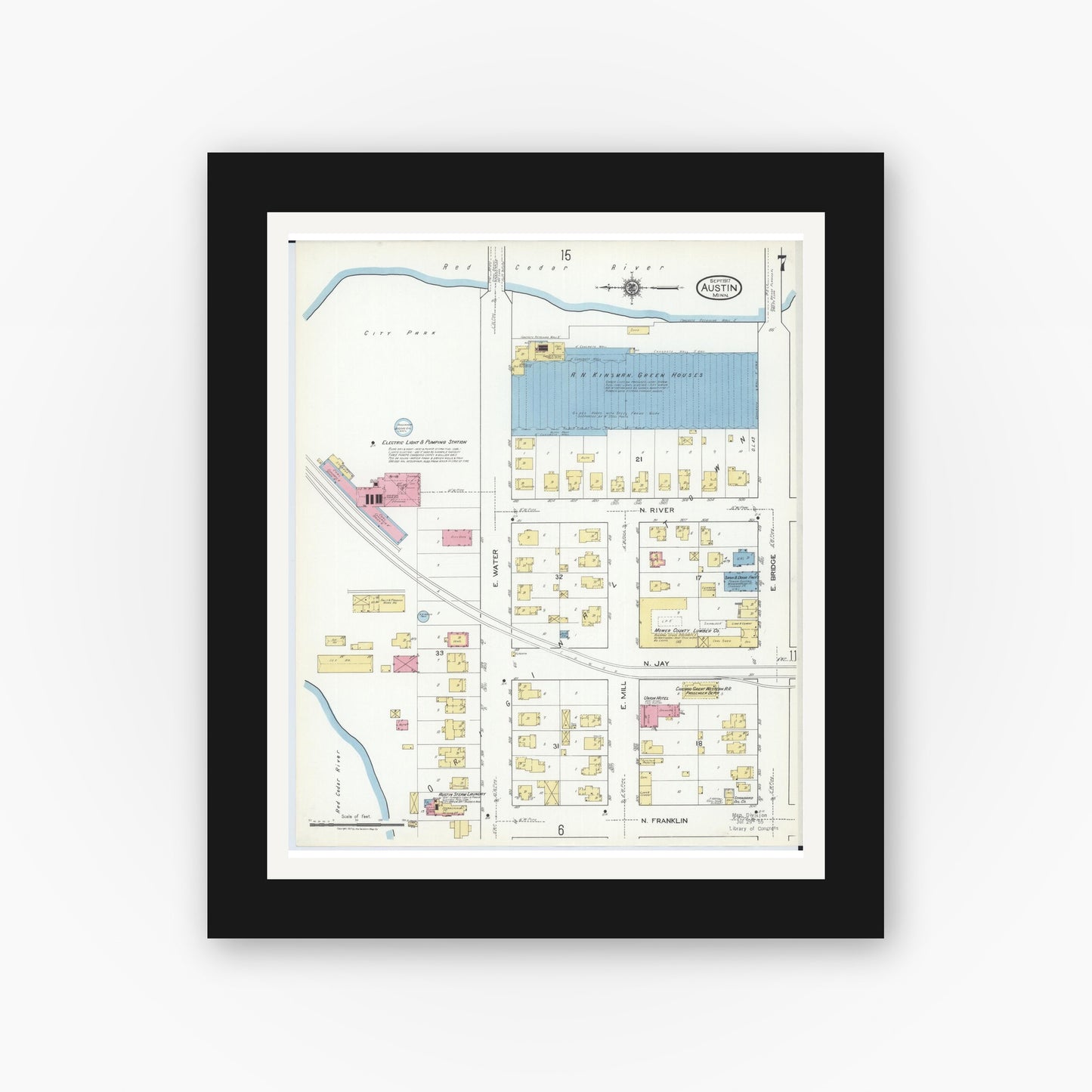 Old map wall art mockup — black gallery frame with white mat — Sanborn Fire Insurance Map from Austin, Mower County, Minnesota (1917), Sheet #0007