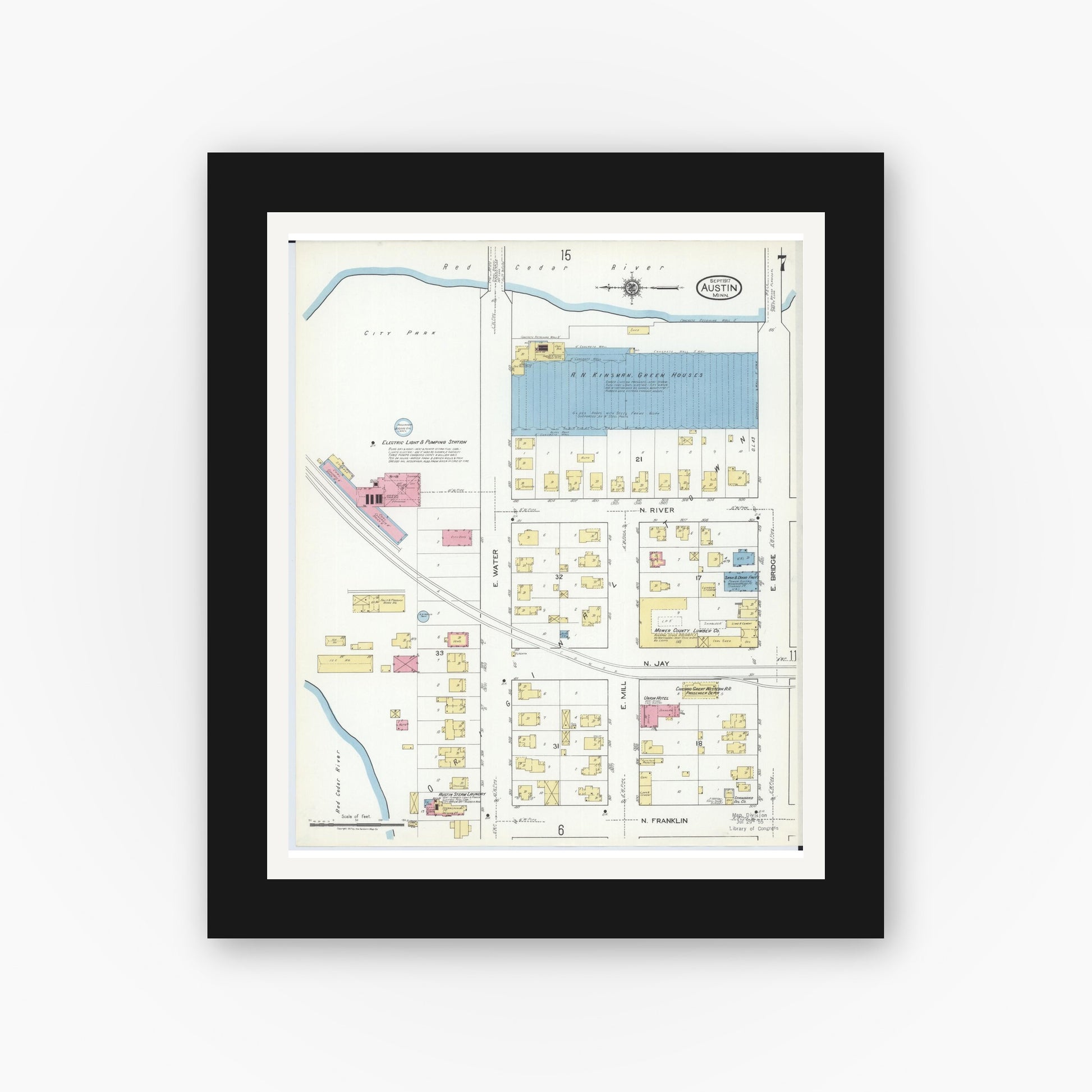 Old map wall art mockup — black gallery frame with white mat — Sanborn Fire Insurance Map from Austin, Mower County, Minnesota (1917), Sheet #0007