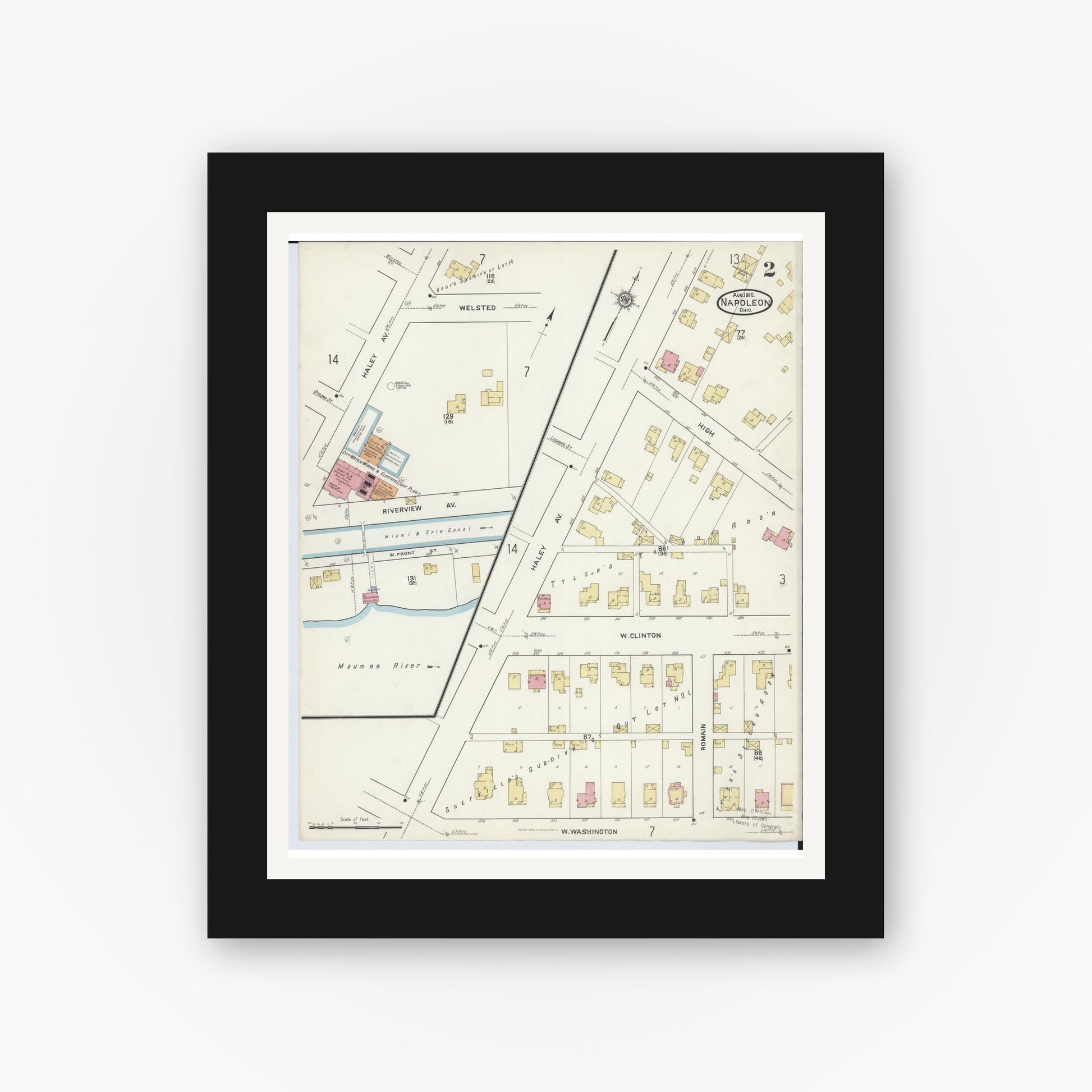 Old map wall art mockup — black gallery frame with white mat — Sanborn Fire Insurance Map from Napoleon, Henry County, Ohio (1916), Sheet #0002