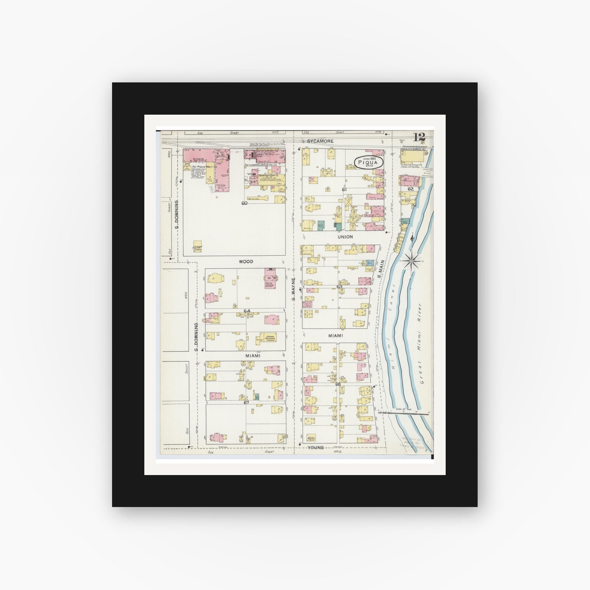Old map wall art mockup — black gallery frame with white mat — Sanborn Fire Insurance Map from Piqua, Miami County, Ohio (1892), Sheet #0012