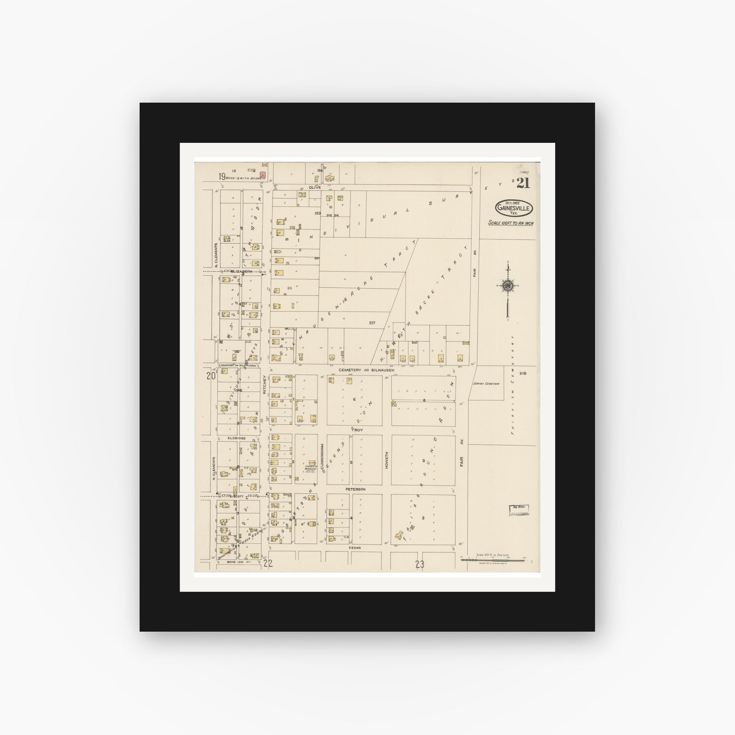 Old map wall art mockup — black gallery frame with white mat — Sanborn Fire Insurance Map from Gainesville, Cooke County, Texas (1922), Sheet #0021