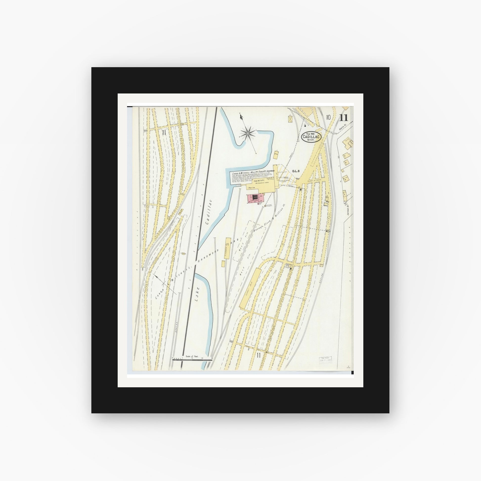 Old map wall art mockup — black gallery frame with white mat — Sanborn Fire Insurance Map from Cadillac, Wexford County, Michigan (1906), Sheet #0011