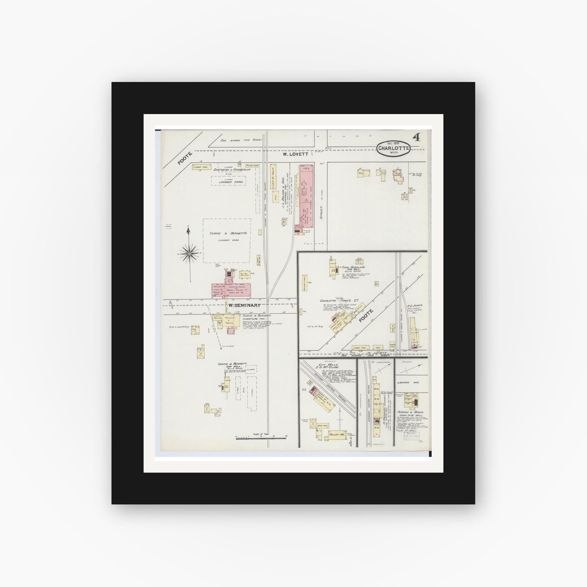 Old map wall art mockup — black gallery frame with white mat — Sanborn Fire Insurance Map from Charlotte, Eaton County, Michigan (1890), Sheet #0004