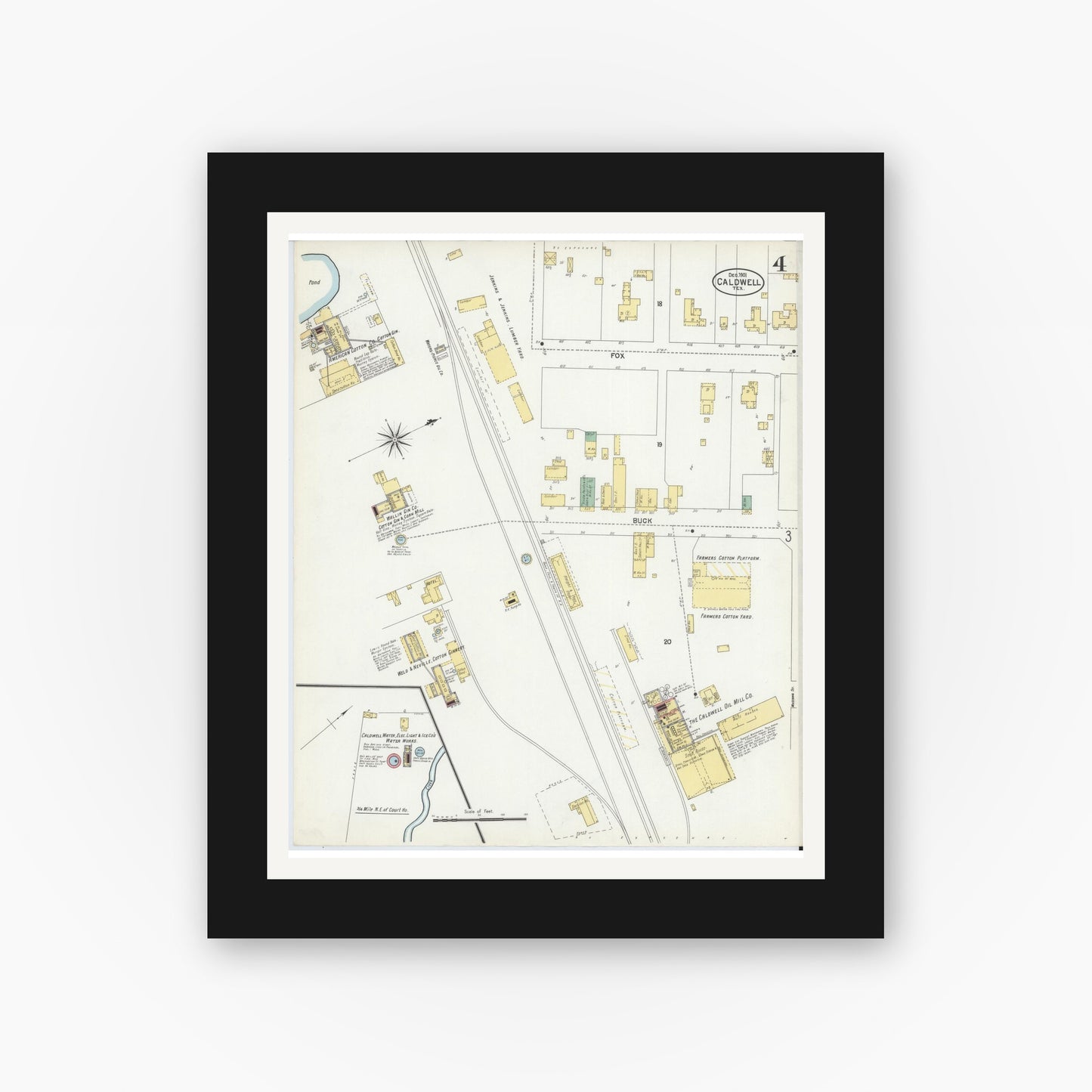 Old map wall art mockup — black gallery frame with white mat — Sanborn Fire Insurance Map from Caldwell, Burleson County, Texas (1901), Sheet #0004