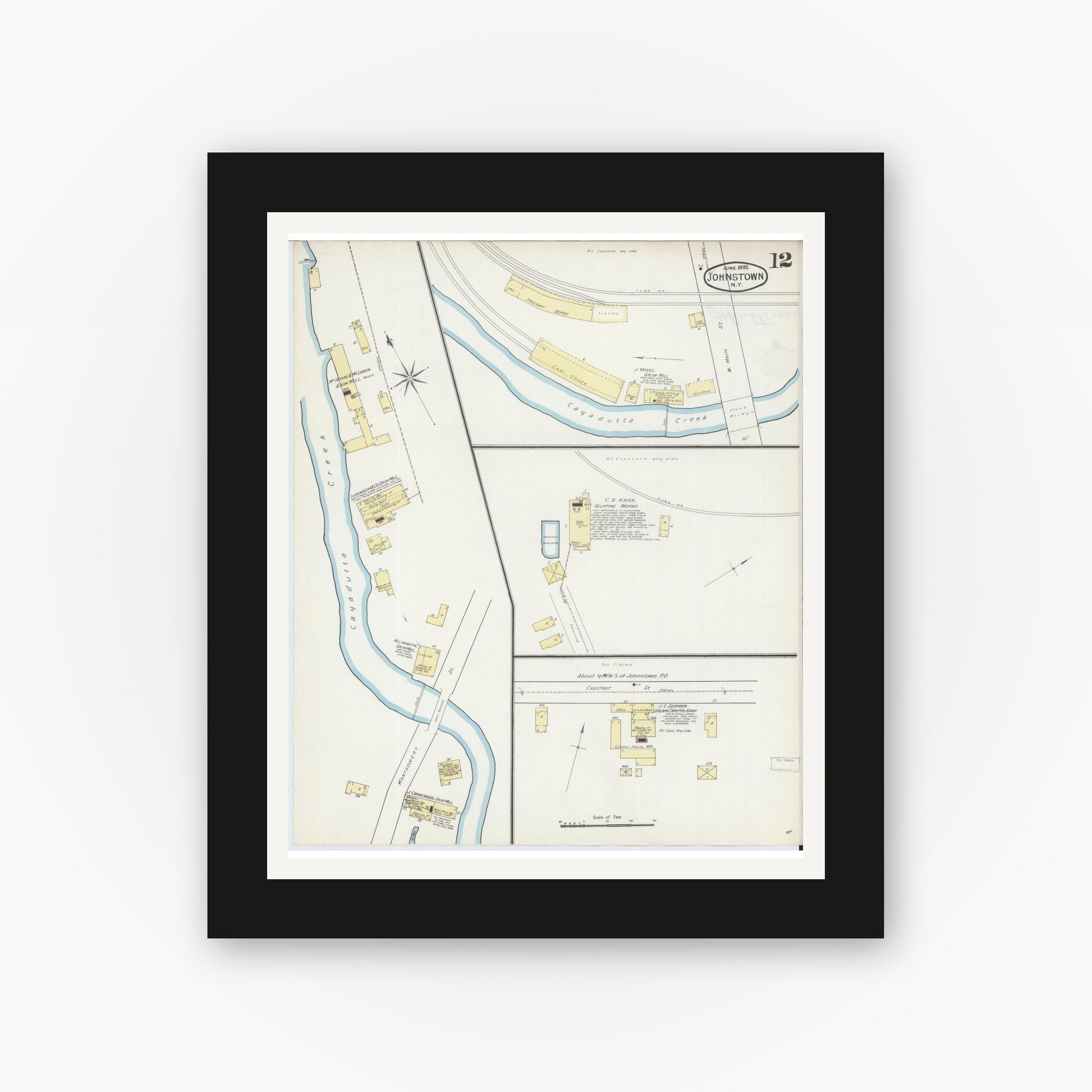 Old map wall art mockup — black gallery frame with white mat — Sanborn Fire Insurance Map from Johnstown, Fulton County, New York (1892), Sheet #0012