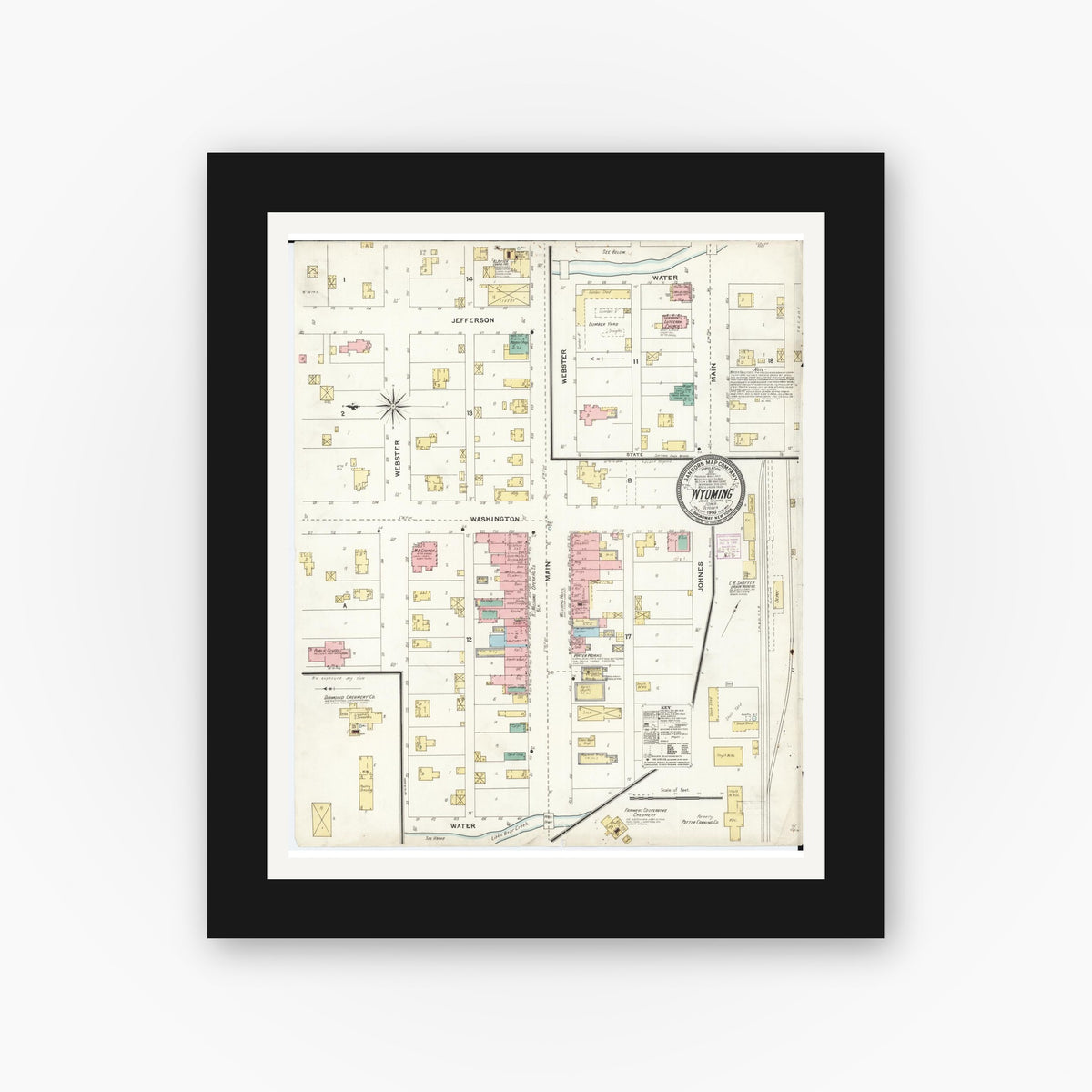 Old map wall art mockup — black gallery frame with white mat — Sanborn Fire Insurance Map from Wyoming, Jones County, Iowa (1905), Sheet #0001