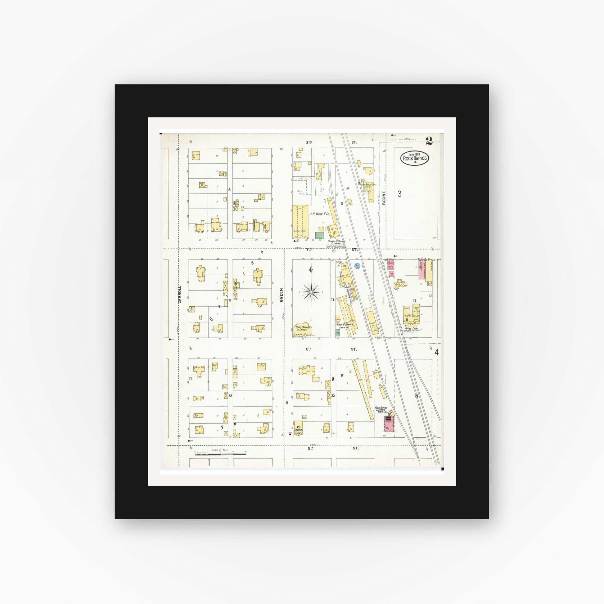 Old map wall art mockup — black gallery frame with white mat — Sanborn Fire Insurance Map from Rock Rapids, Lyon County, Iowa (1899), Sheet #0002
